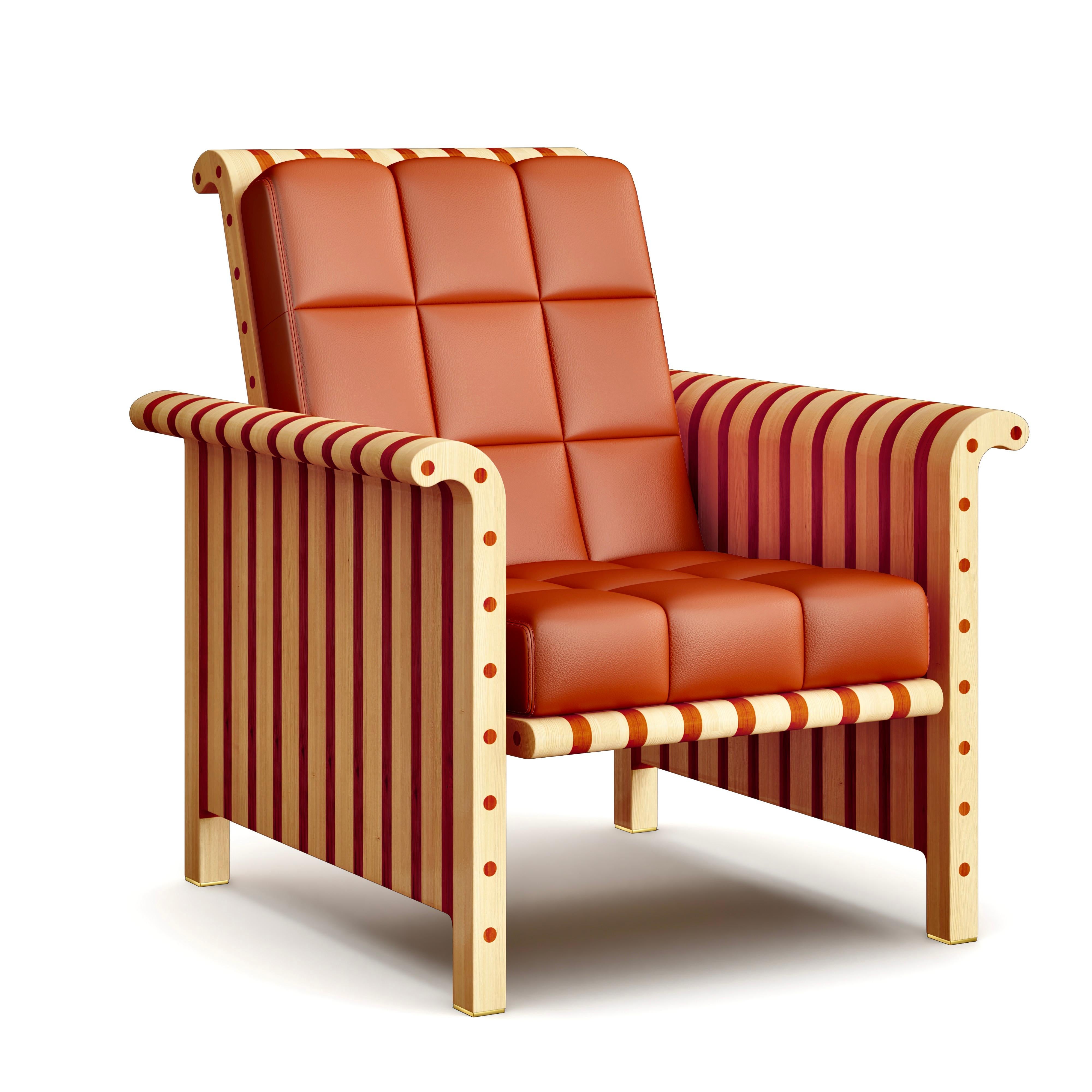 This stunning lounge chair is part of the Striped Series by Troy Smith Studio.

This lounge chair is unique, original, and 100% crafted by hand out of solid maple wood from North America and Padauk sourced from Africa. It comes with a hand-sewn seat