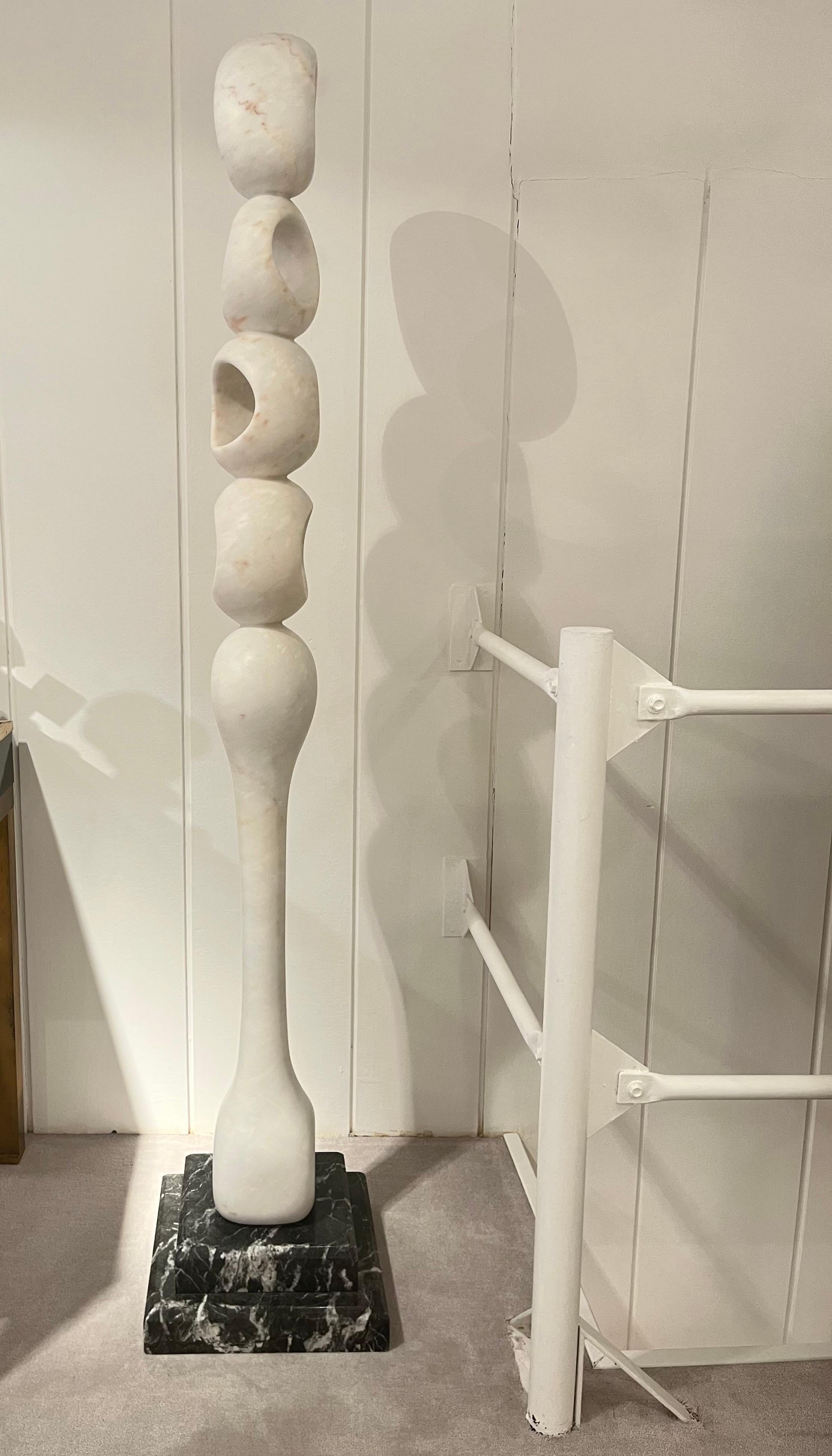 Large white marble floor sculpture with black marble base.
One of a kind sculpture signe by the artist.
Jean Frederic Bourdier.
Sculpture turns 360.