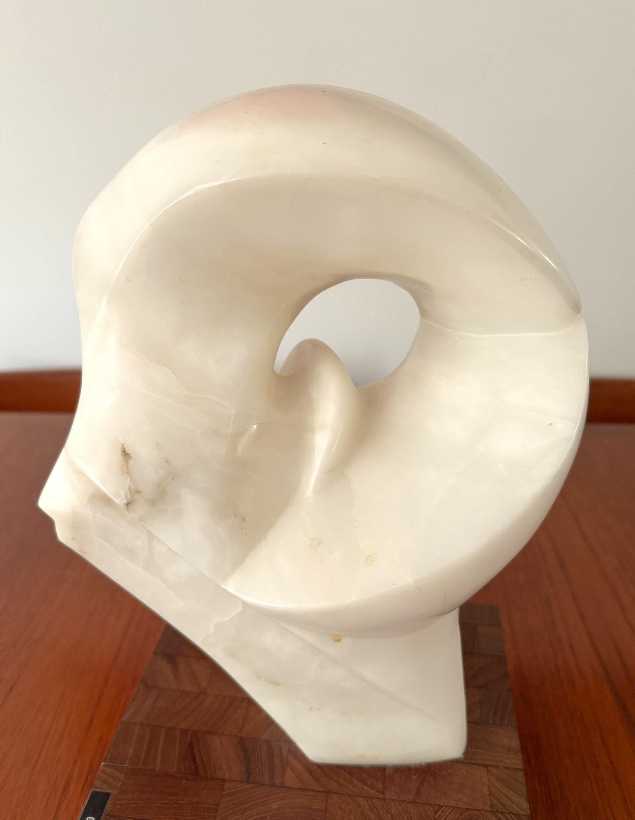 White Marble Abstract Sculpture Dichotomy Bio Morphic. Smooth texture and fluid shape. The sculpture sits on wood base and can be rotated to get different light and shape perspectives. Any questions feel free to email, message or call. Thank you!