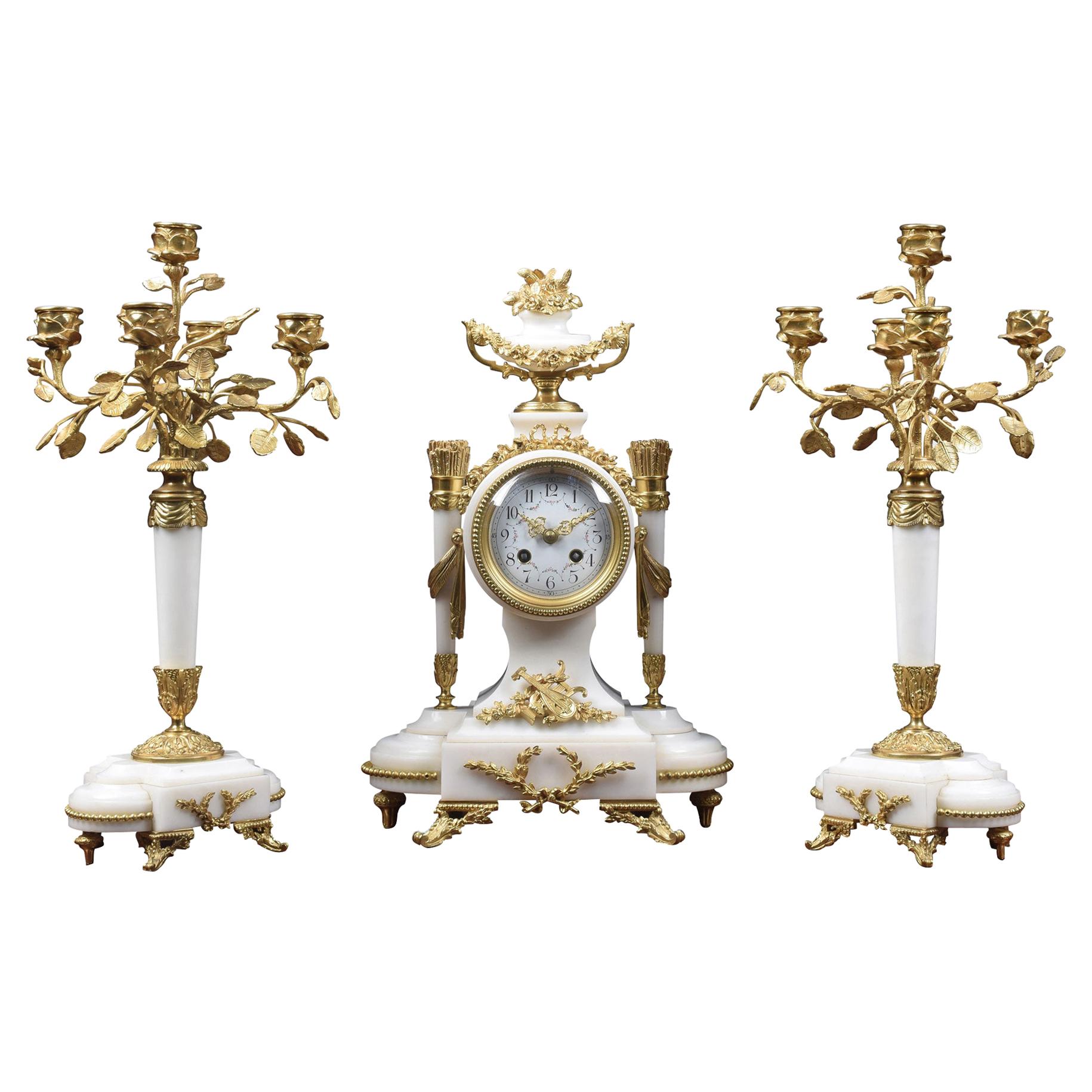 White Marble and Gilt Metal Mounted Clock Set