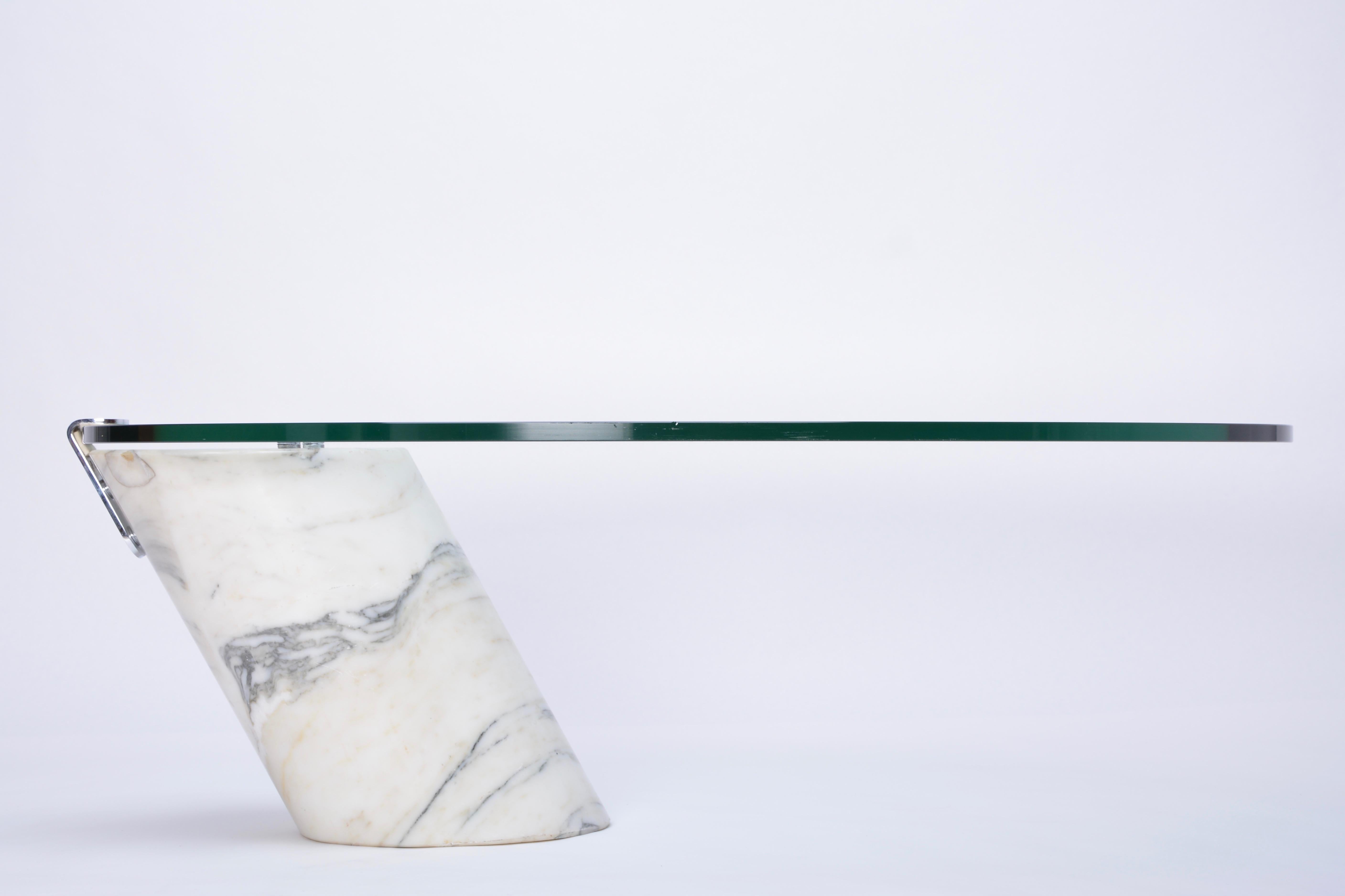 White Marble and Glass Coffee Table Model K1000 by Team Form for Ronald Schmitt

Coffee table designed by Team Form for Ronald Schmitt in the 1970s. The base of this table is made from solid marble. The thick oval glass top lays loose on the marble