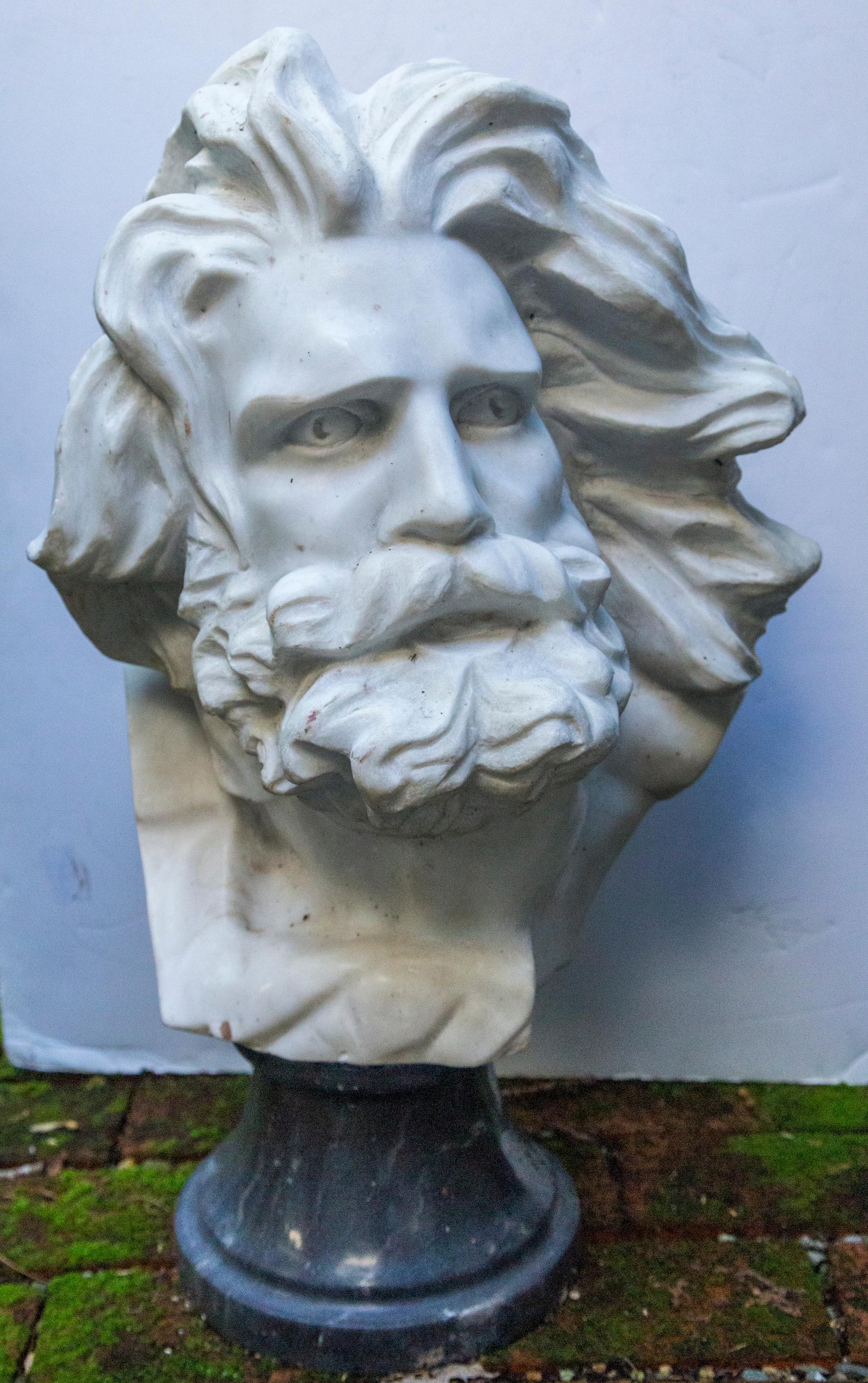 Raised on a dark gray marble socle it is 25 inches tall. The socle has a 9 inch diameter
The dimensions below are of the bust itself.
Perhaps he is a representation of Zeus or another of the Olympian gods of ancient Greece or their Roman