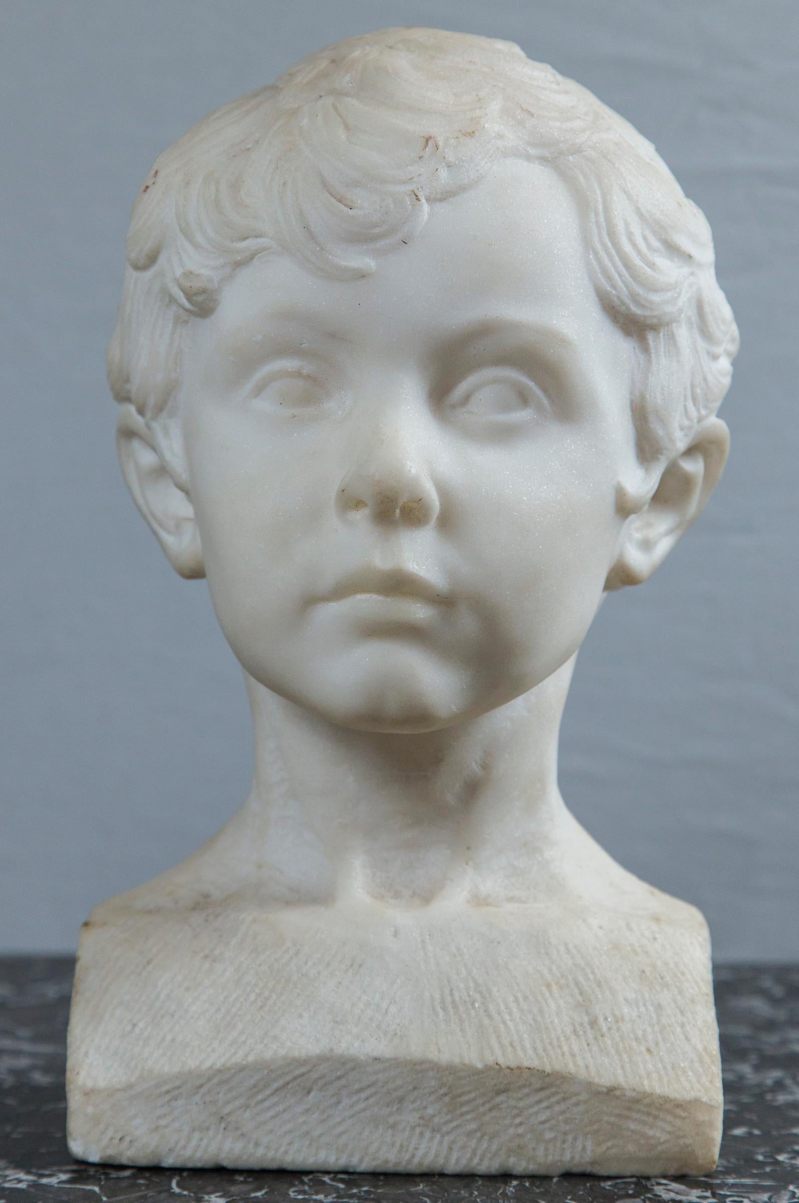 Delicately carved features on this unsigned bust.
The base measures 7 wide and 5.5 deep
The chisel marks are evident on the back and sides of the base.