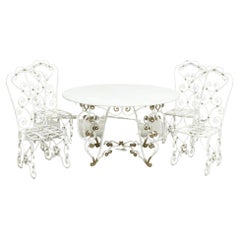 Table et chaises de jardin circulaires en marbre blanc
