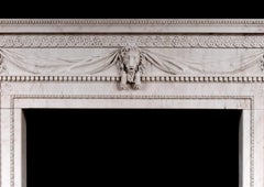 White Marble Fireplace with Carved Lion's Mask