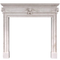 White Marble Fireplace with Carved Lion's Mask