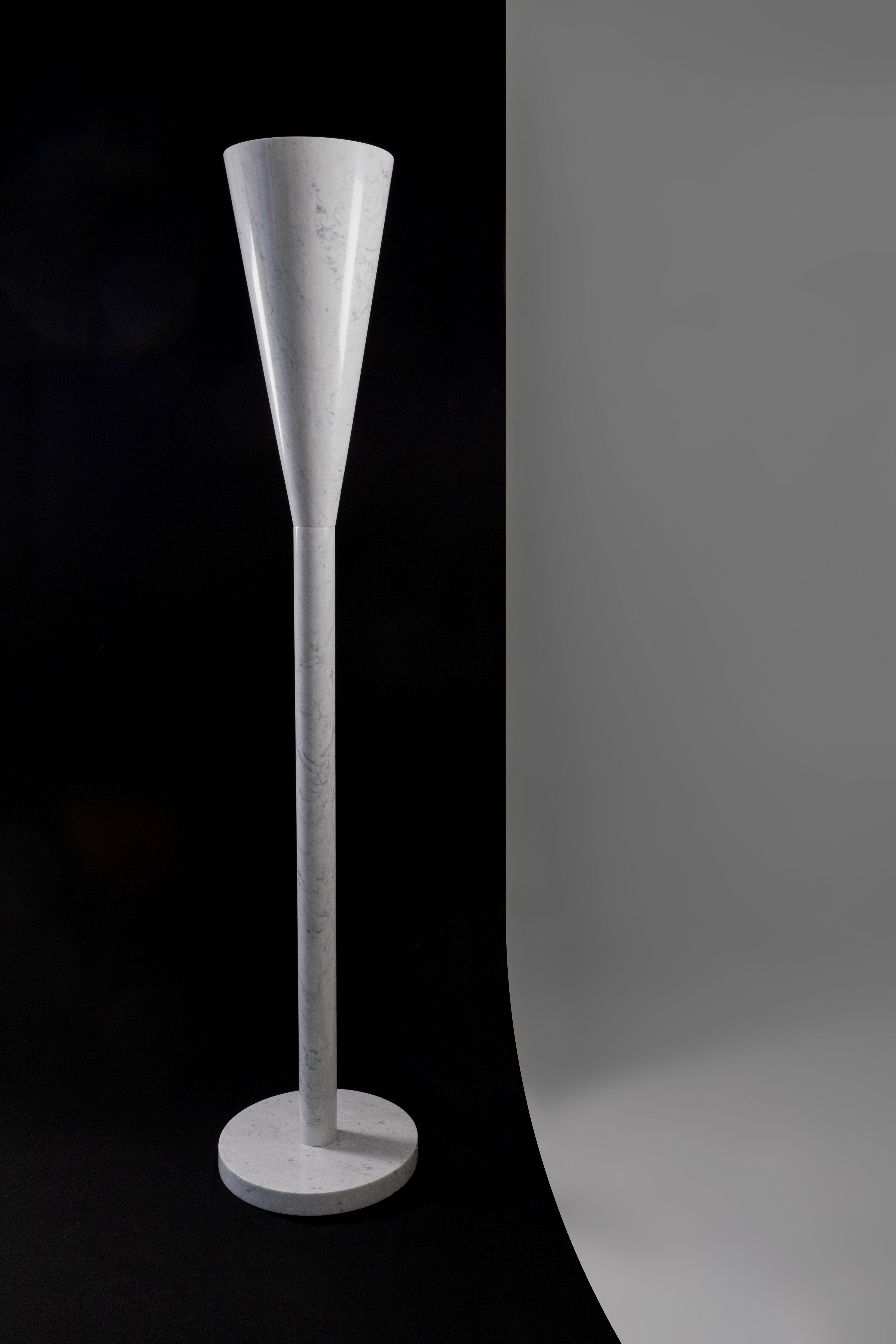Floor lamp, made entirely of white Carrara marble, special and limited edition, only 5 pieces in the world.
Created by sculptor Teo Martino for the Entropia Design gallery.
The lamp has a refined and elegant line, the sculptor wanted to reinterpret