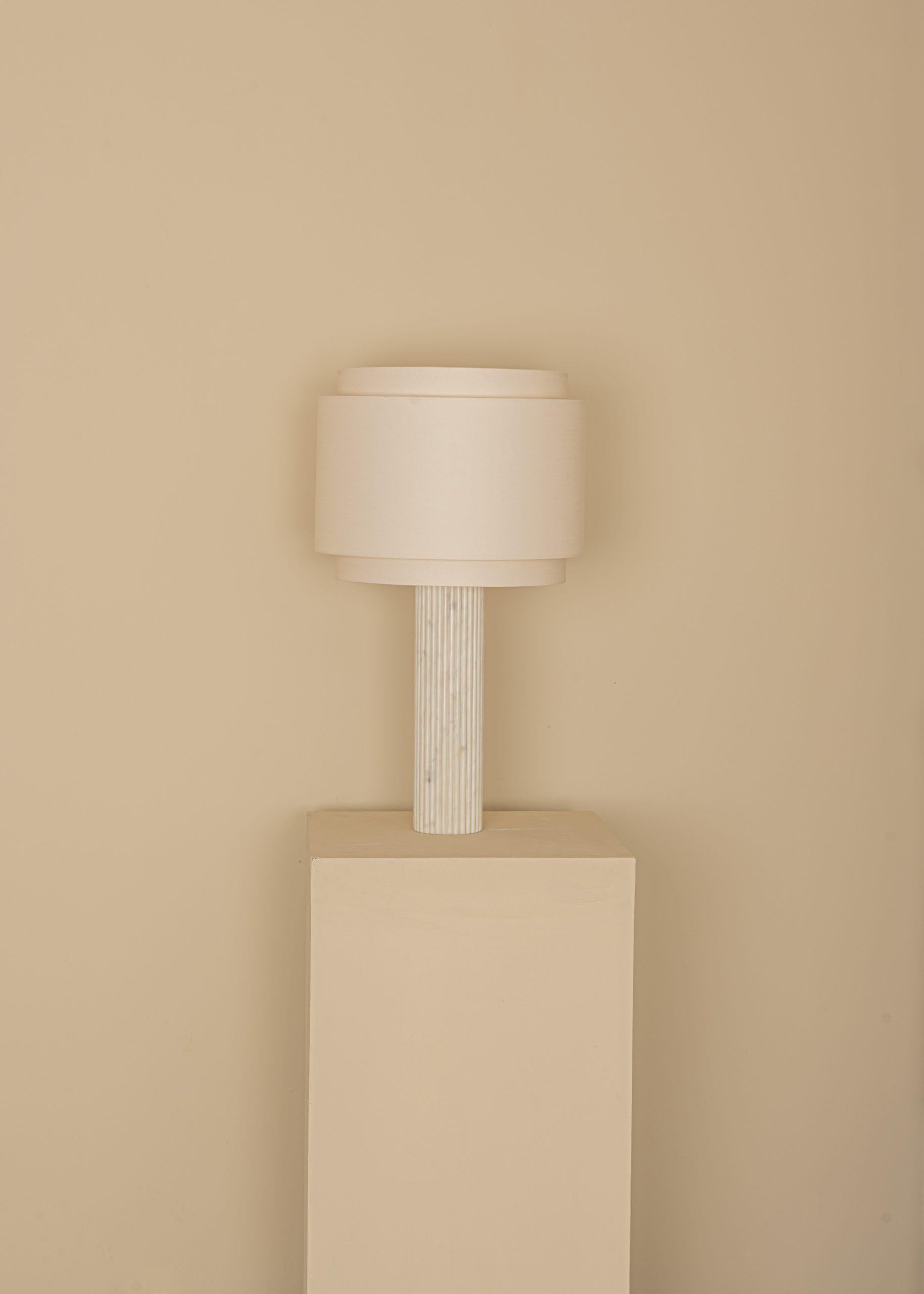 White Marble Fluta DuobleTable Lamp by Simone & Marcel
Dimensions: D 35 x W 35 x H 60 cm.
Materials: Cotton and white marble.

Also available in different marble and wood options and finishes. Custom options available on request. Please contact us.
