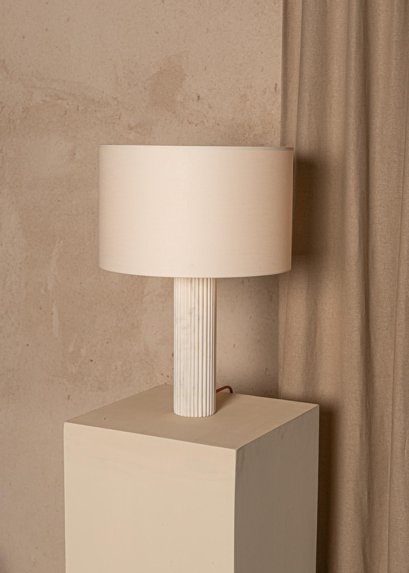 White Marble Fluta Table Lamp by Simone & Marcel
Dimensions: Ø 40 x H 58 cm.
Materials: Cotton and white marble.

Also available in different marble and wood options and finishes. Custom options available on request. Please contact us. 

All our