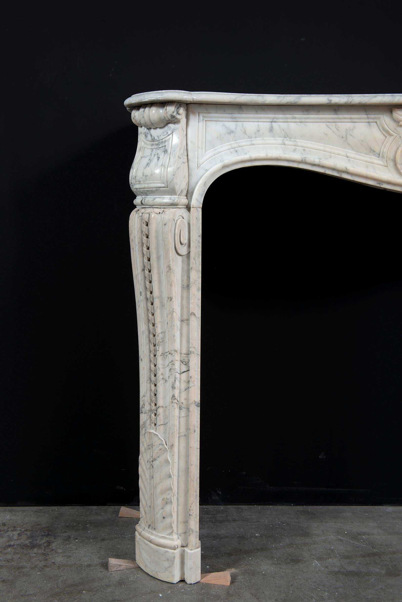 Carved White Marble Louis XV Fireplace Mantel For Sale