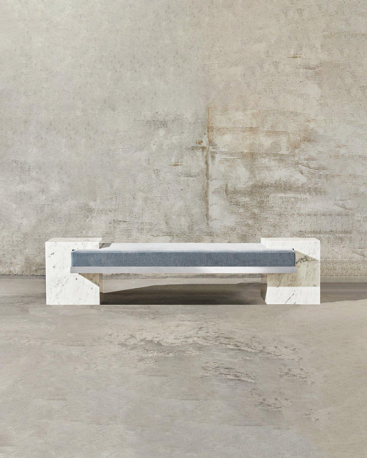 The coexist bench uses balance and delicate harmony of materials meeting. The bench consists of a brushed nickel frame, Carrara marble cubes, and mattress upholstered in mohair fabric. 

The pieces fit together seamlessly, with the marble cubes