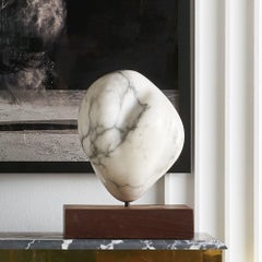 White Marble Sculpture on Wood Base