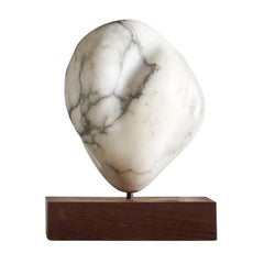 White Marble Sculpture on Wood Base