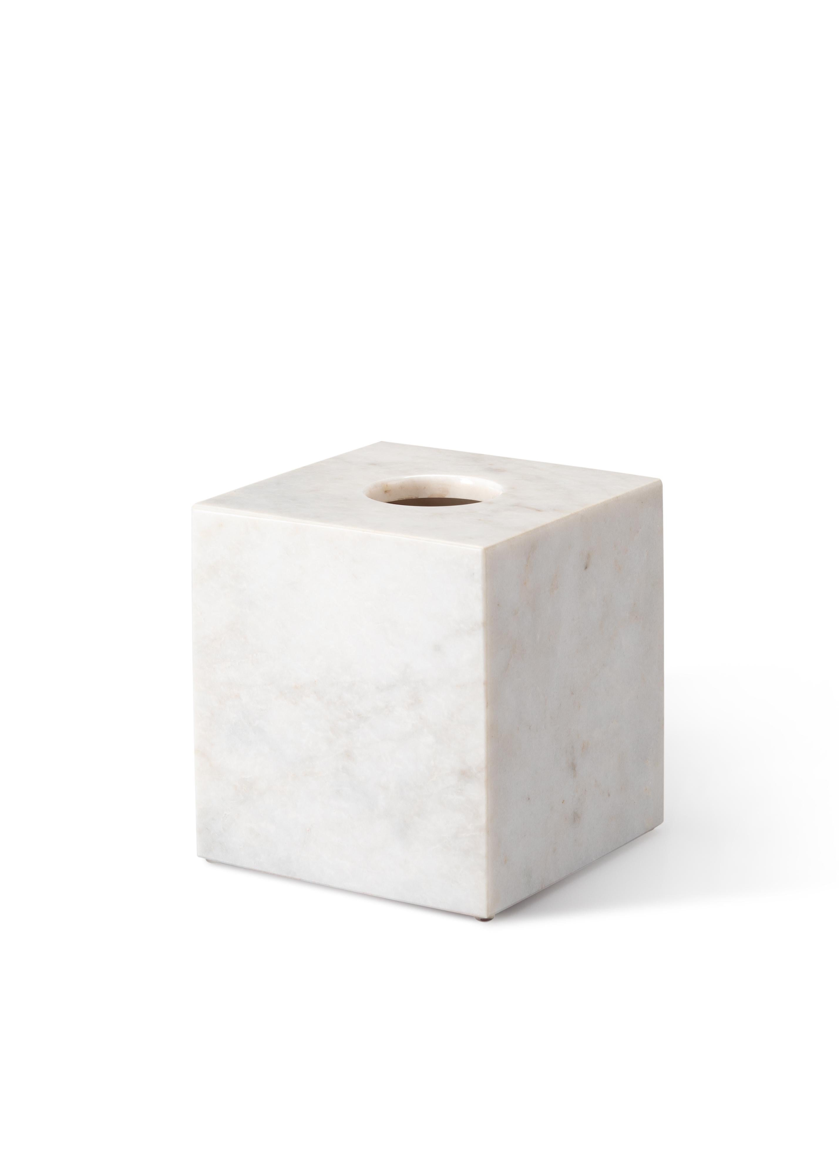 Crafted entirely by hand, this marble tissue box cover is a fusion of form and function, seamlessly blending into any space while adding sophistication and elegance. Clean, minimalist lines highlight the natural veining of the marble, making each