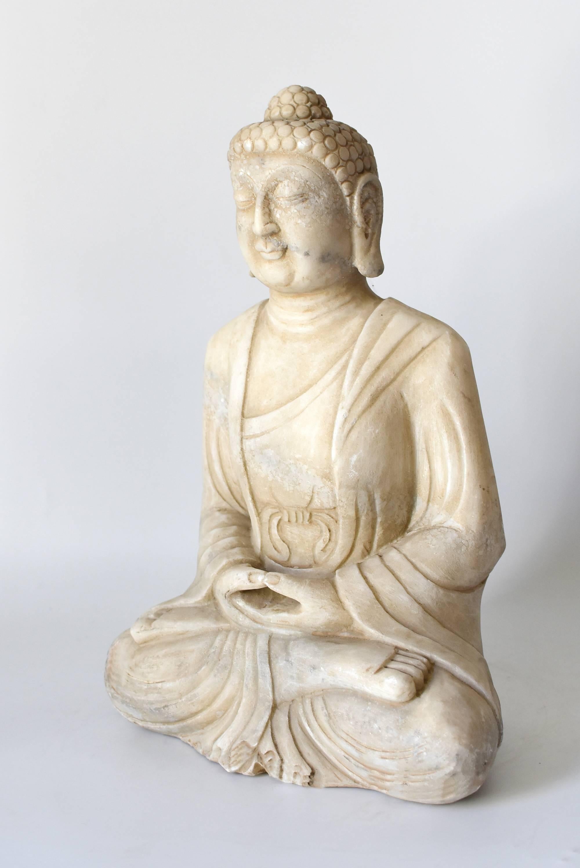 white marble buddha statue