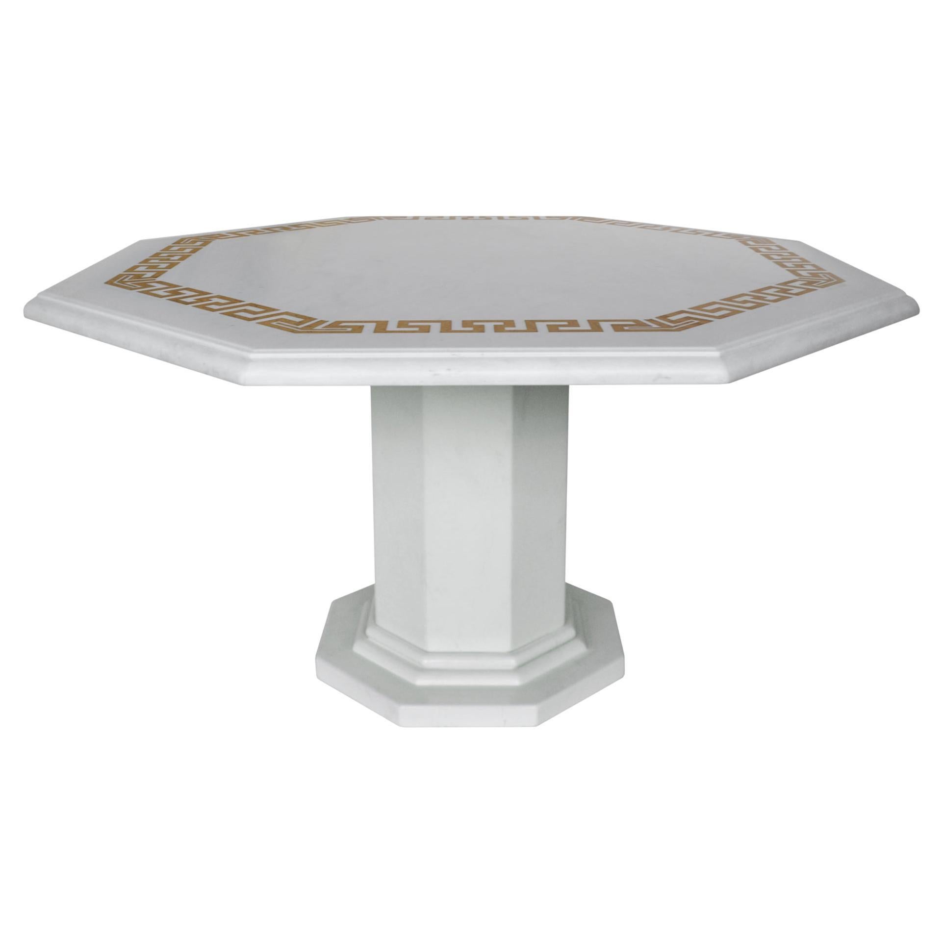White Marble Table Octagonal top and Lacquered Wooden Central Base .
Imposing and enriched with refined accents, this extraordinary dining table creates a luxurious ambiance in a modern and classic dining room.
This octagonal table has been