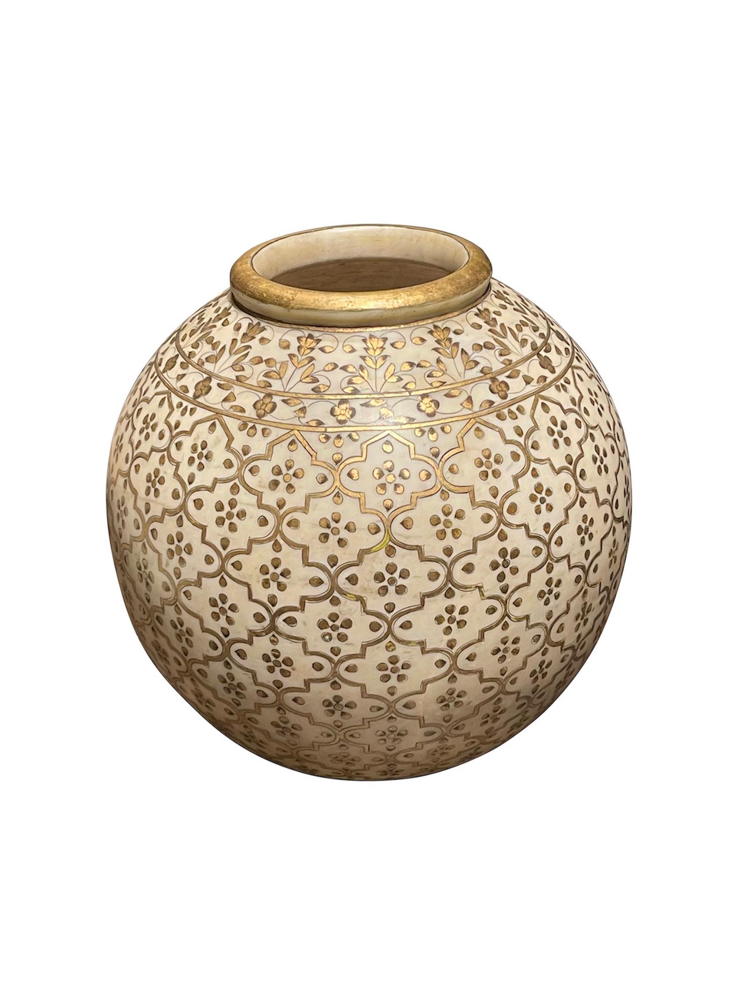 Contemporary Indian white marble bowl with decorative printed gold overlay.
Gold trims the opening.
