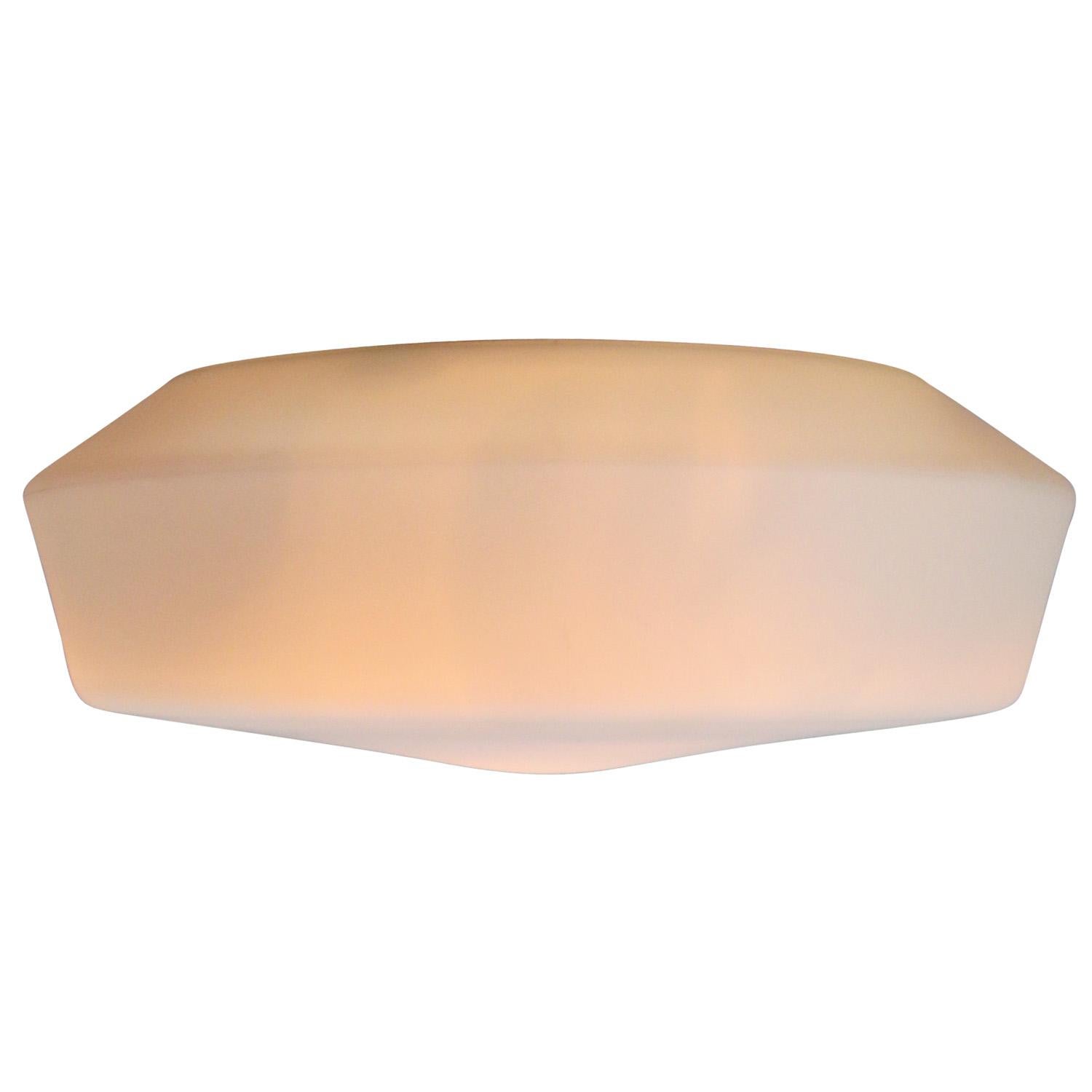Large German Opaline industrial ceiling lamp.
DKN Leuchten made by RZB Rudolph Zimmerman Bamberg Leuchten

Designed by Rudolph Zimmerman
Metal base with white opaline glass

1x E27 / E26

Weight: 1.00 kg / 2.2 lb

PPriced per individual