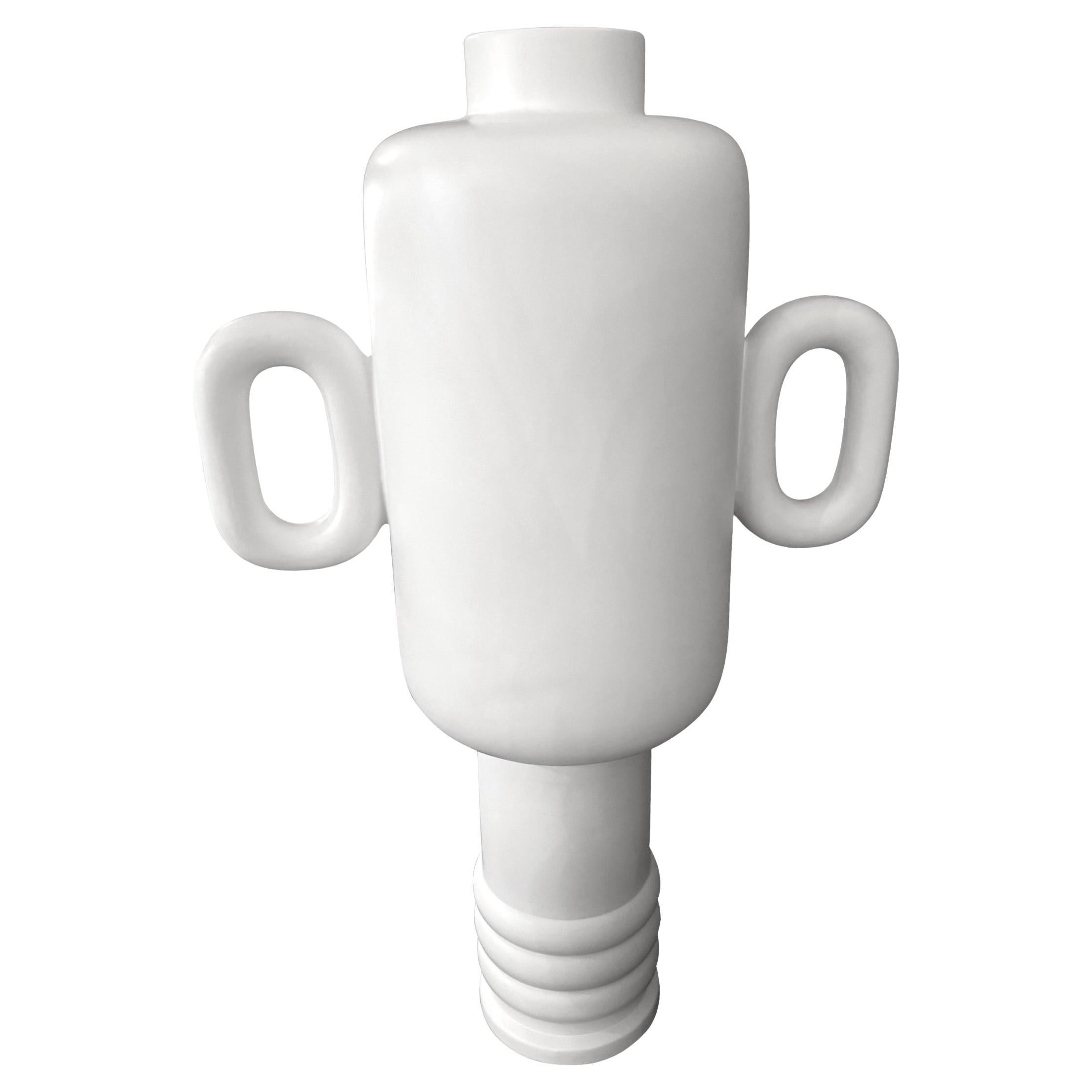 Contemporary French matte white vase with two handles.
Horizontal rib detailing at base.
From a collection of varying sizes and shapes.