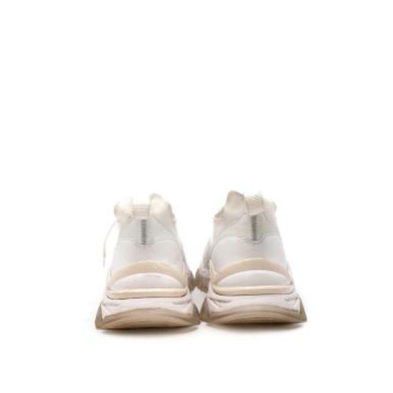 Moncler White Mesh & Leather Leave No Trace Mid Sneakers
 

 - White leather and rubber ridged chunky sneakers 
 - Features an almond toe, lace fastening, a logo tag and mesh panels.
 - Clear chunky rubber sole 
 

 Materials
 Mesh
 Leather
 Rubber
