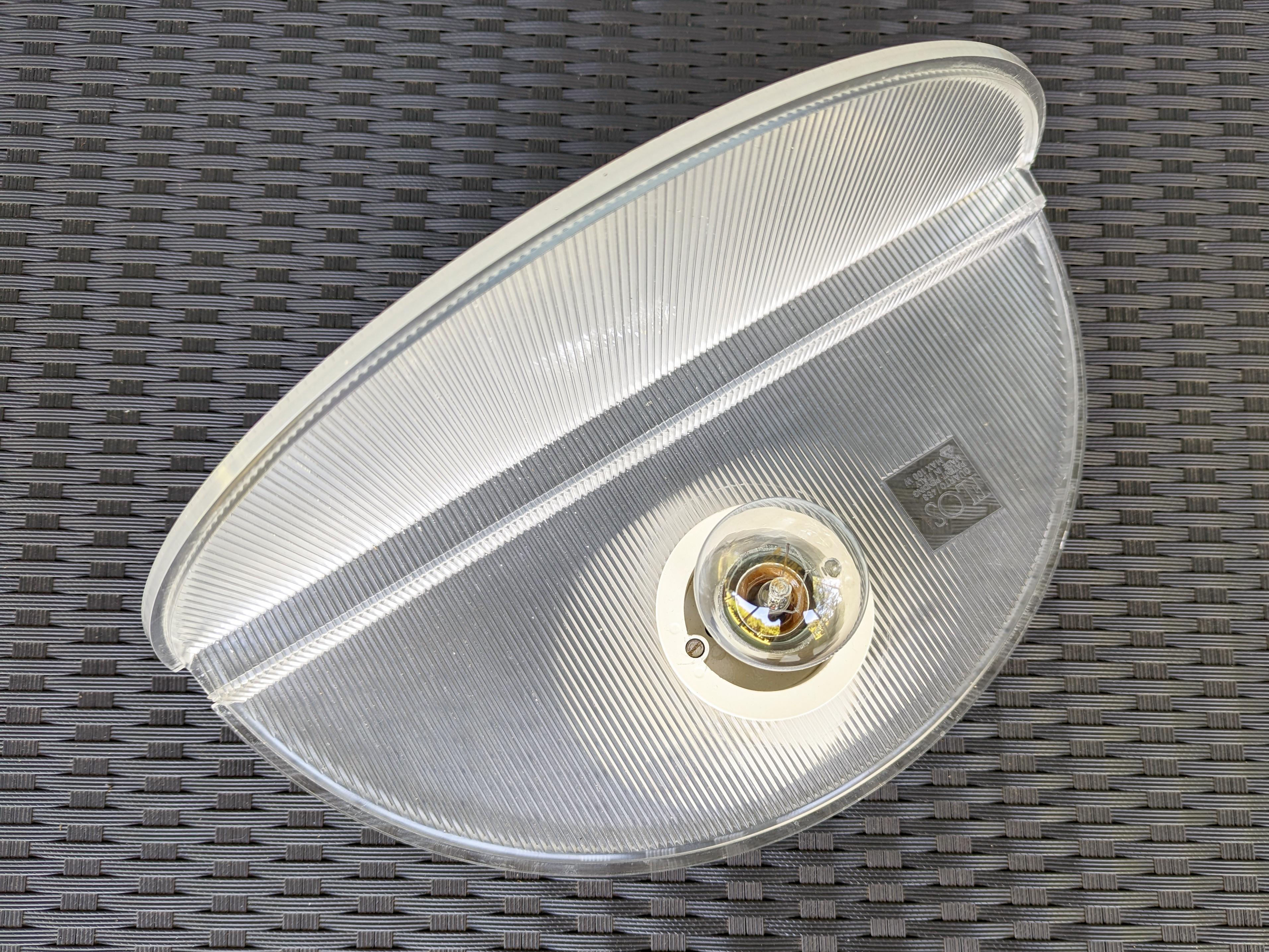 Painted White Metal & clear Polycarbonate Quarto sconce by A. & T. Scarpa for FLos