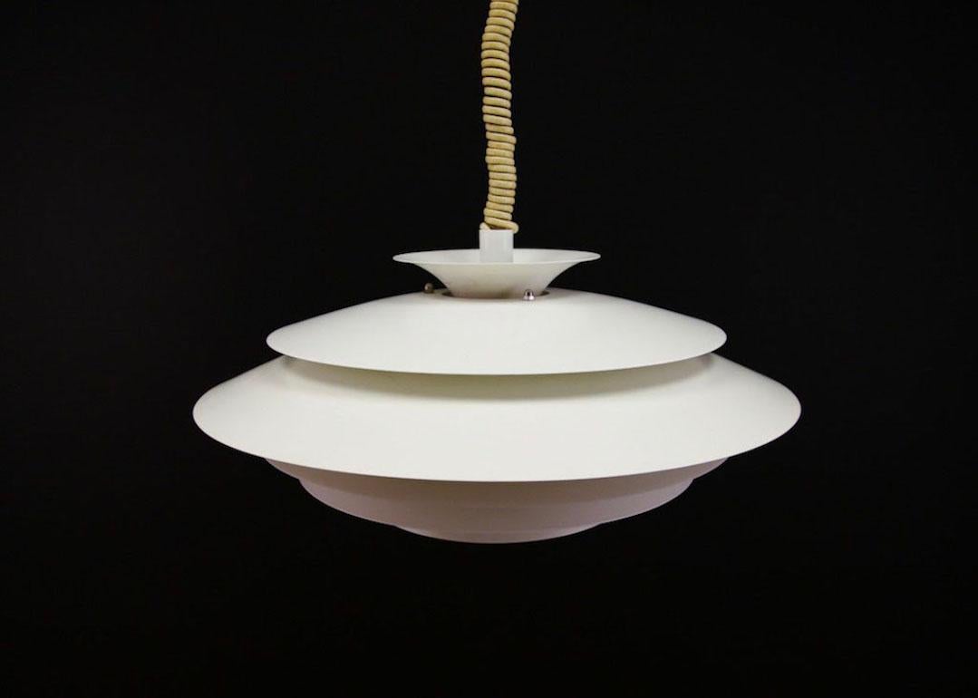 Scandinavian lamp from the 1960s-1970s made of metal, a color, off-white. Height adjustable. Preserved in good condition (minor scratches), directly for use.

Dimensions: Diameter 43 cm.