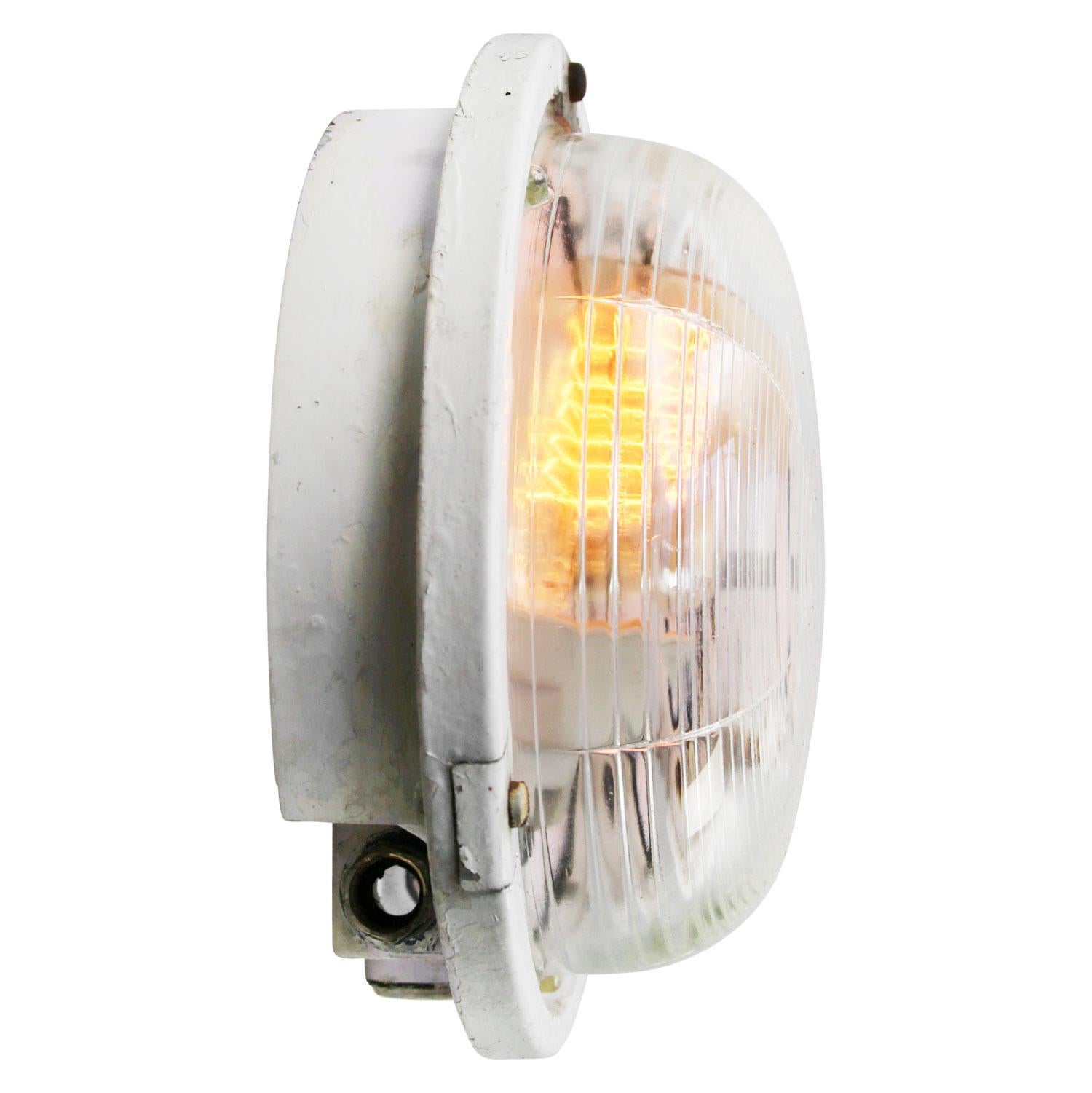 French Industrial wall / ceiling lamp
Metal back plate with clear striped glass.

Weight: 2.00 kg / 4.4 lb

Priced per individual item. All lamps have been made suitable by international standards for incandescent light bulbs, energy-efficient