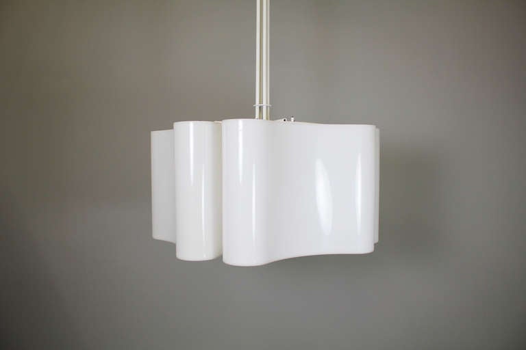 Pendant designed by Vittorio Introini, Stilnovo, circa 1965

This rare pendant is executed in shaped white acrylic glass. 

Measures: Height 116 cm.