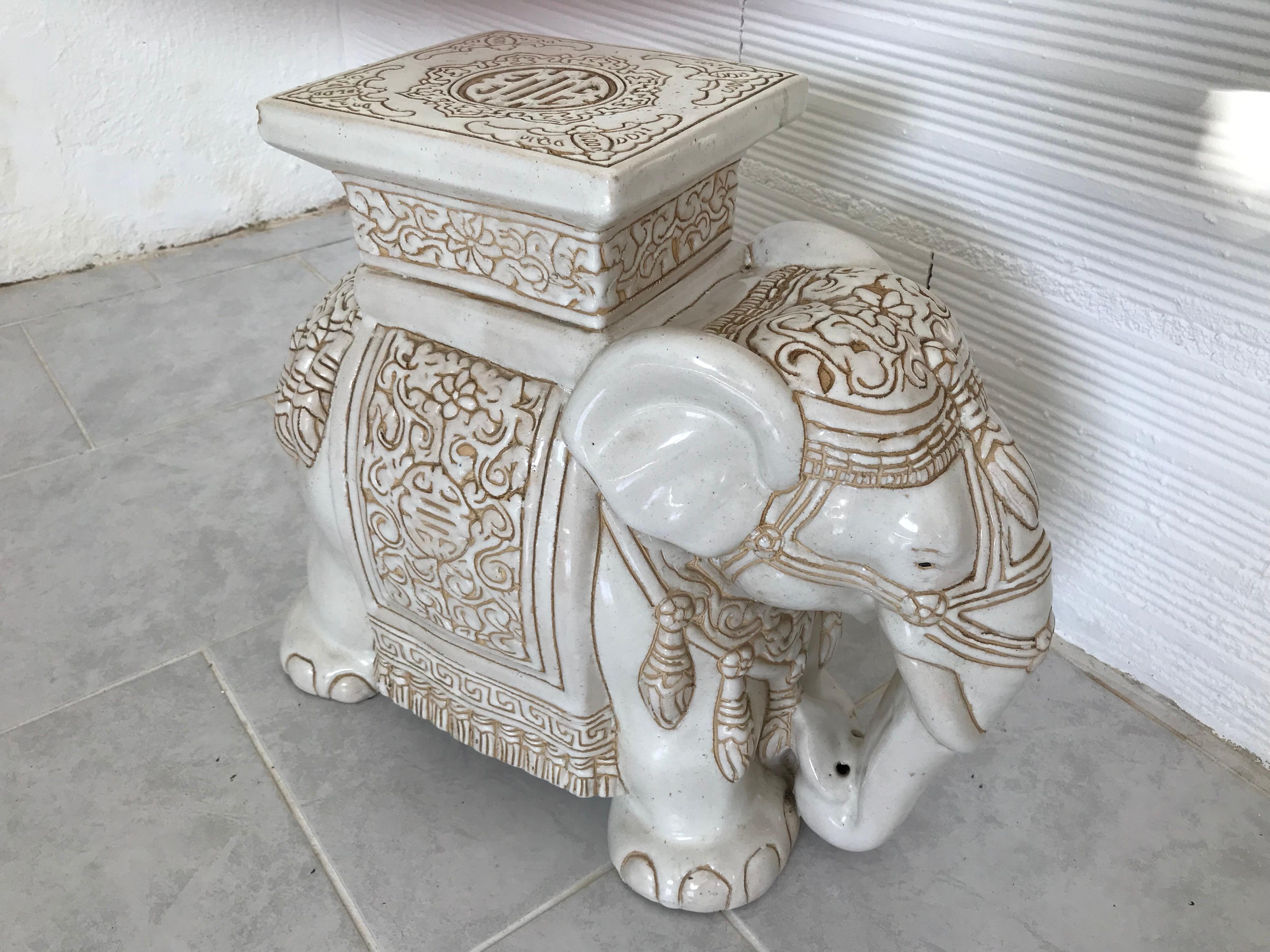 This Asian elephant was manufactured, circa 1960s-1970s and features a Classic design with rare colors. Very often, items like these feature multiple colors while this one was kept very basic in white and sand. Very nice addition to any room as a