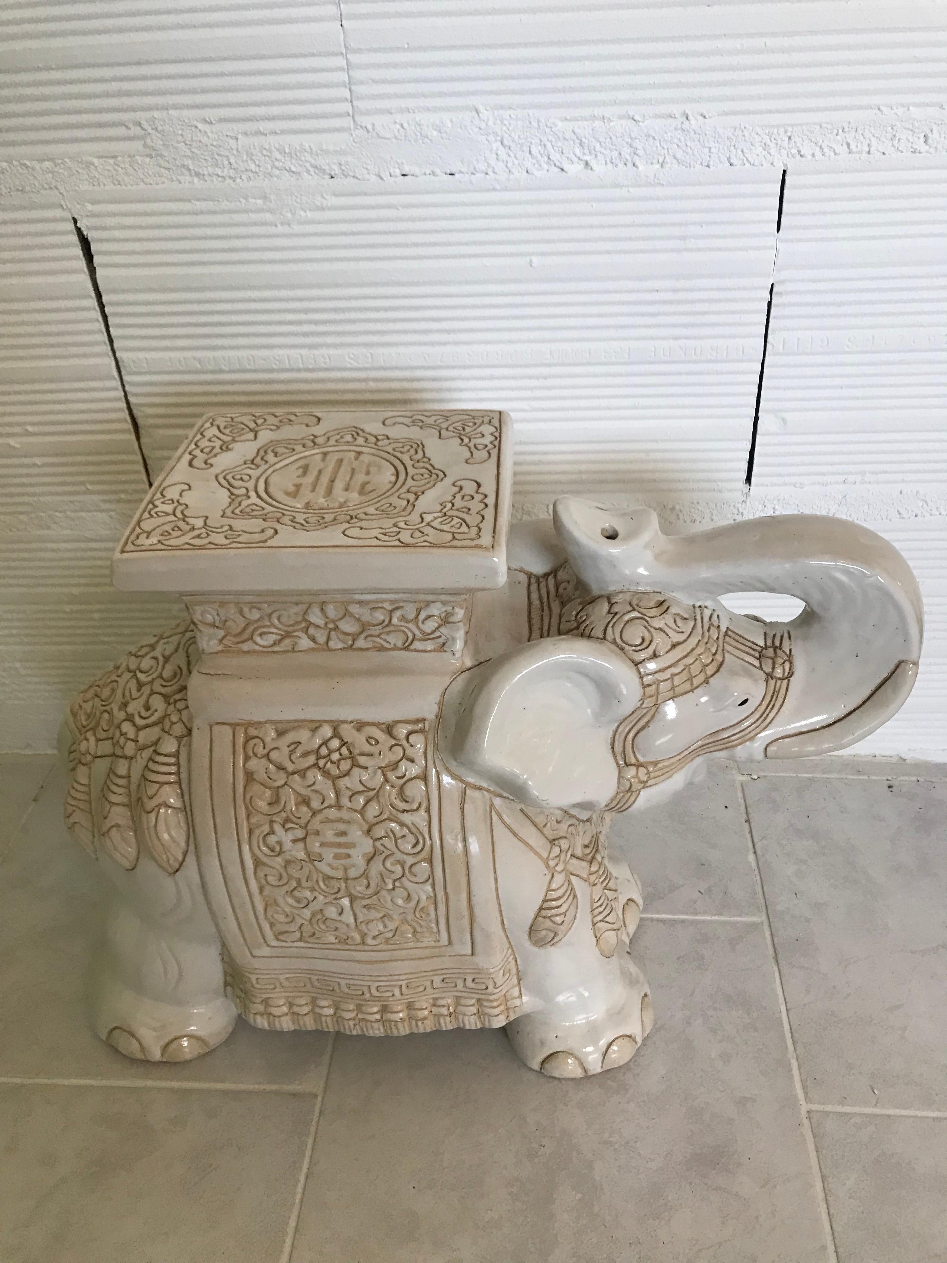 This 'trunk up' Asian elephant was manufactured, circa 1960s-1970s and features a Classic design with rare colors. Very often, items like these feature multiple colors while this one was kept very basic in white and sand. Very nice addition to any