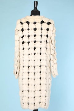 White mink  patchwork coat and metal rings attributed to Paco Rabanne