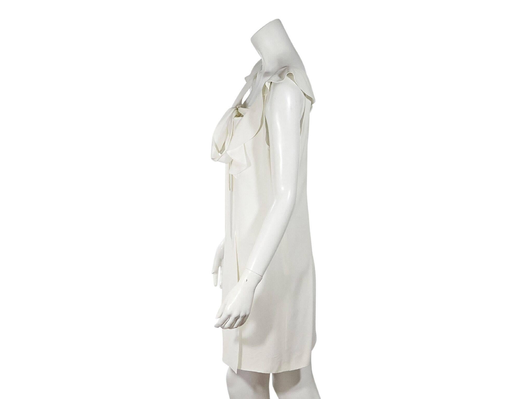 Product details:  White silk dress by Miu Miu.  Scoopneck with tie detail.  Sleeveless.  Concealed side zip closure.  Label size IT 40.  38