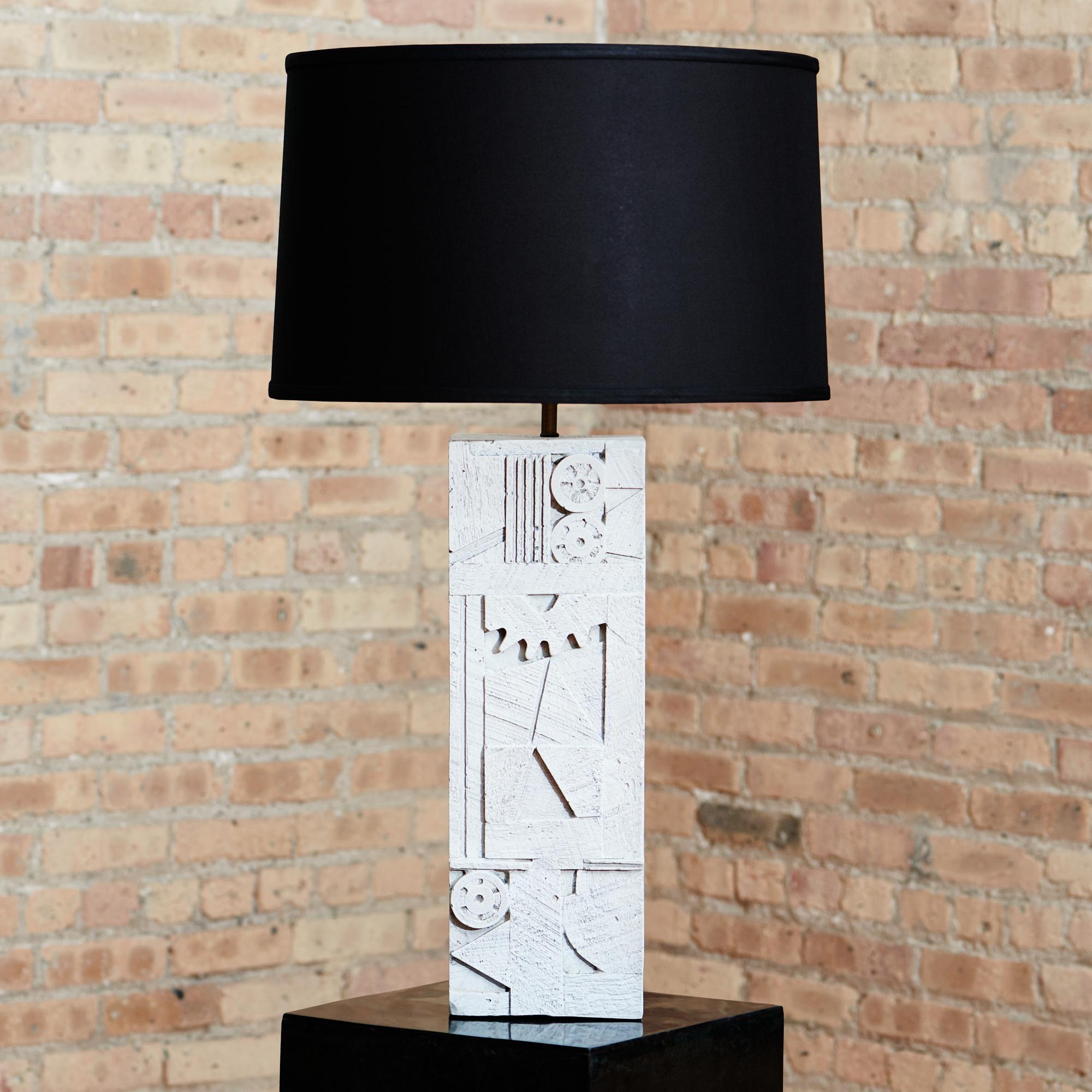 White modern table lamps designed by Dan Schneiger. Lamp consists of wood base finished with acrylic paint to create a modern look inspired by the cross section of architecture and nature. 

Each lamp is one of one and comes in various finishing