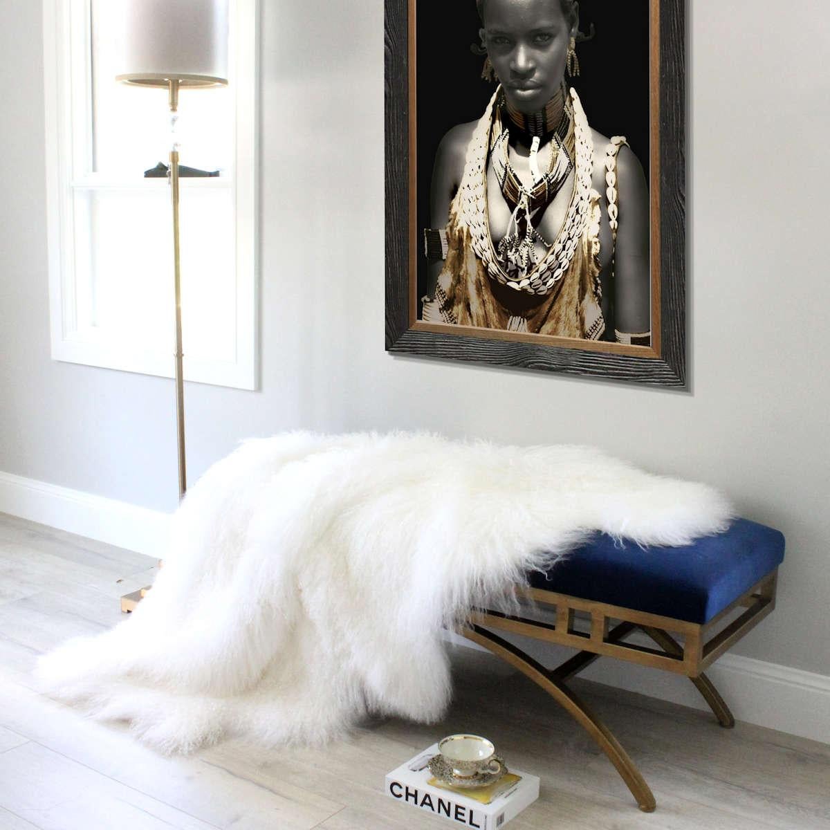 Add luxurious natural textures to a decor with this White Mongolian Fur Throw rug. Whether styling a sofa or adding glam to a wardrobe or nursery floors, this exquisite fur will elevate the elegance and luxe giving you the versatility in styling as
