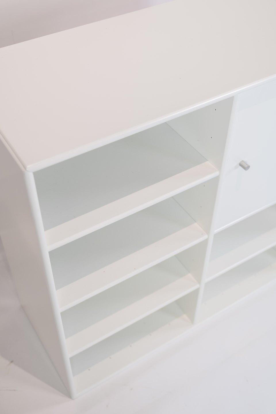 White Montana module with cabinet and 6 shelves, designed by Peter J. Lassen.
    