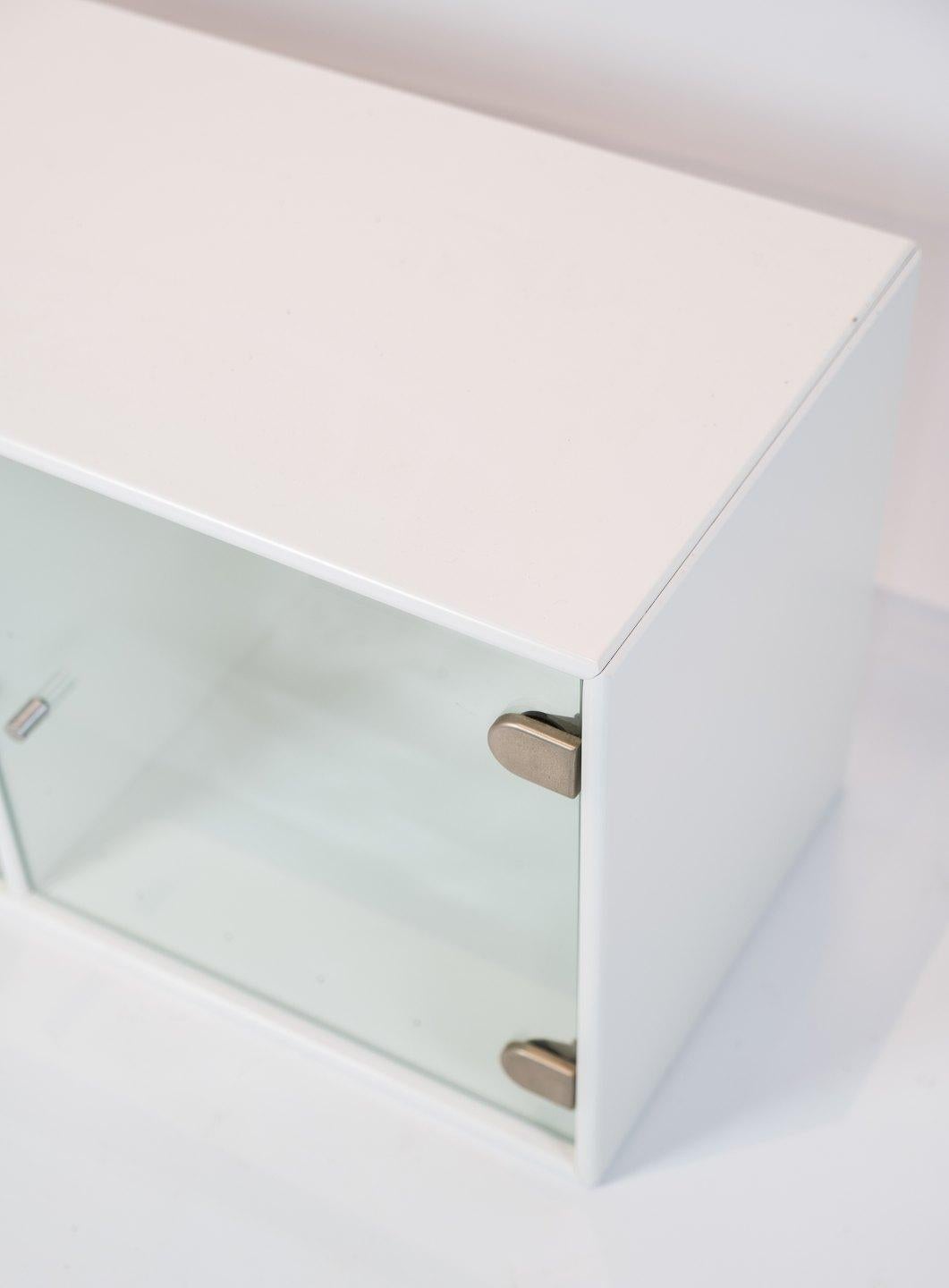 White Montana module with glass doors. We have 3 pieces in stock.