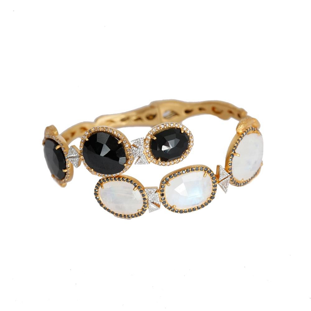 Affinity Bracelet Set in 20 Karat Yellow Gold with 1.80-carat Diamonds, 0.91-carat Black Diamonds, 13.54-carat White Moonstone, and 13.43-carat Black Spinel. The contrasting stones represent harmony and are symbolized by their unity in this bracelet.