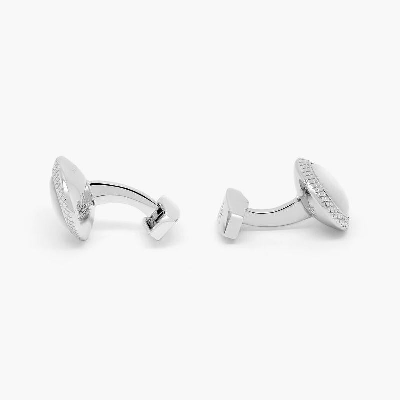 White Mother of Pearl Bullseye cufflinks

Our classic round cufflinks feature semi-precious stones and our signature diamond pattern. The perfect pairing for the ultimate business collection. Finished with rhodium plated base metal and white mother