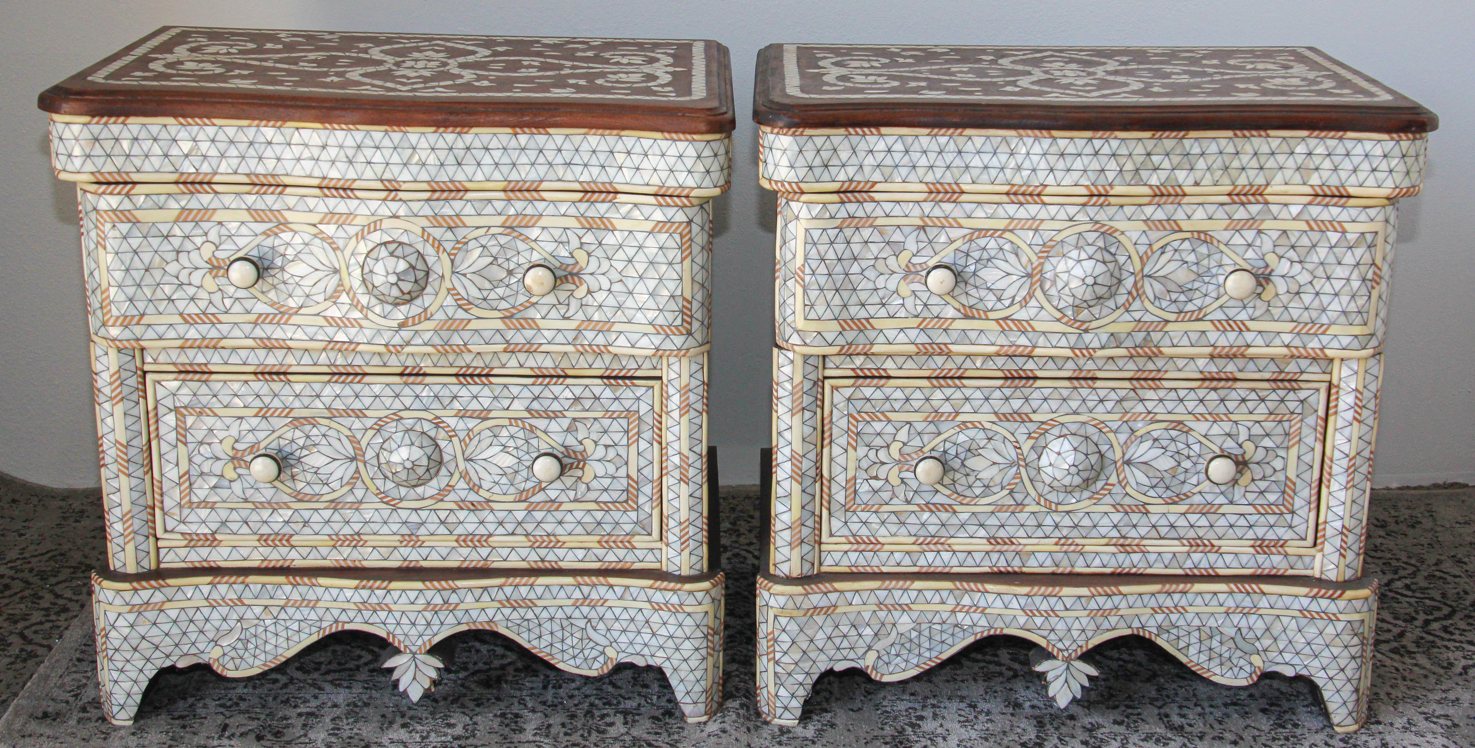 Fabulous Middle Eastern Syrian style Moroccan nightstands.
Pair of handcrafted contemporary Moorish Moroccan dresser with two drawers, wood inlay with white mother of pearl.
Moorish arches and intricate Islamic designs.
Dowry chest of drawers