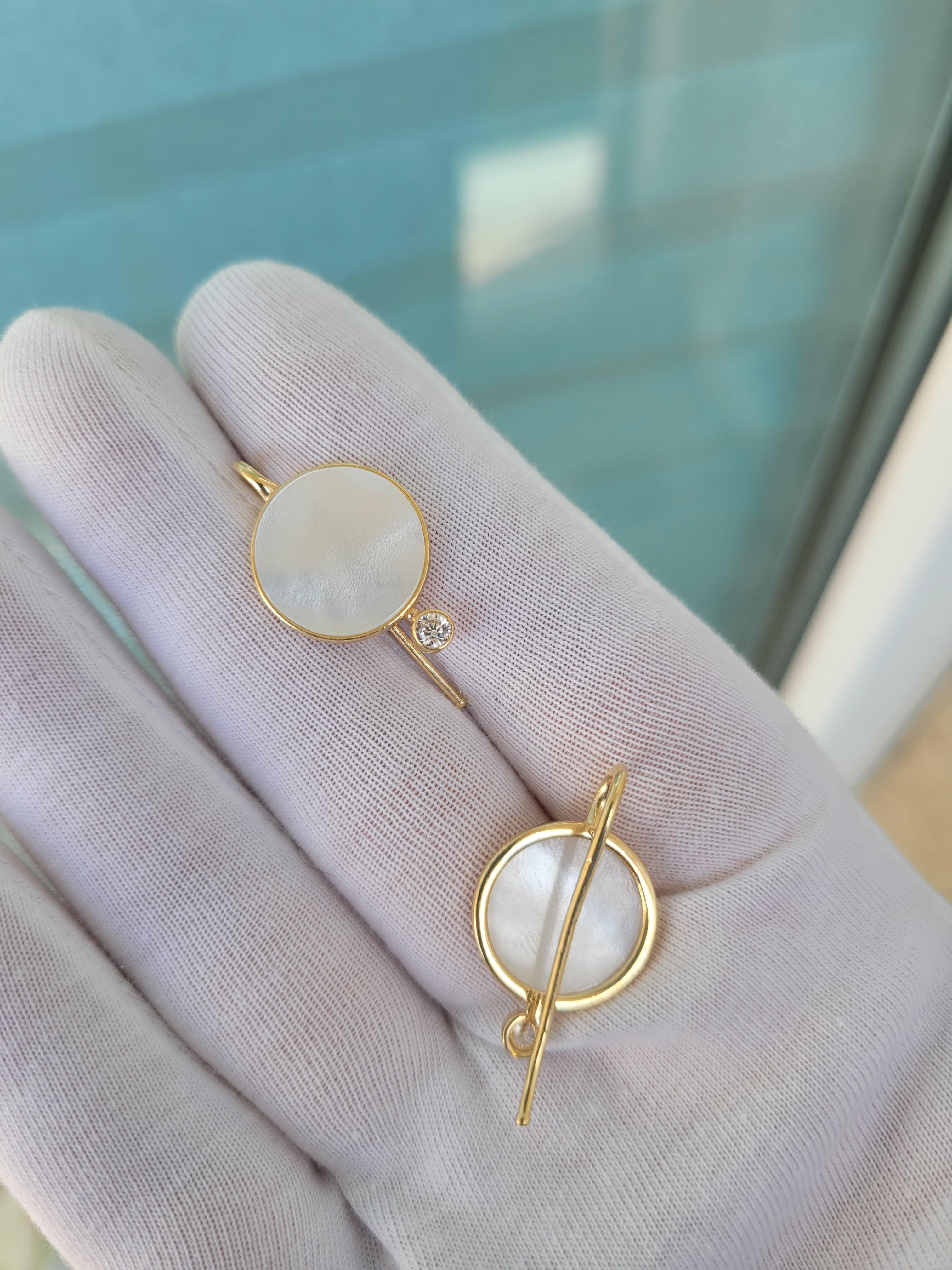 White Mother Of Pearl Shell Earrings with moissanite. 1