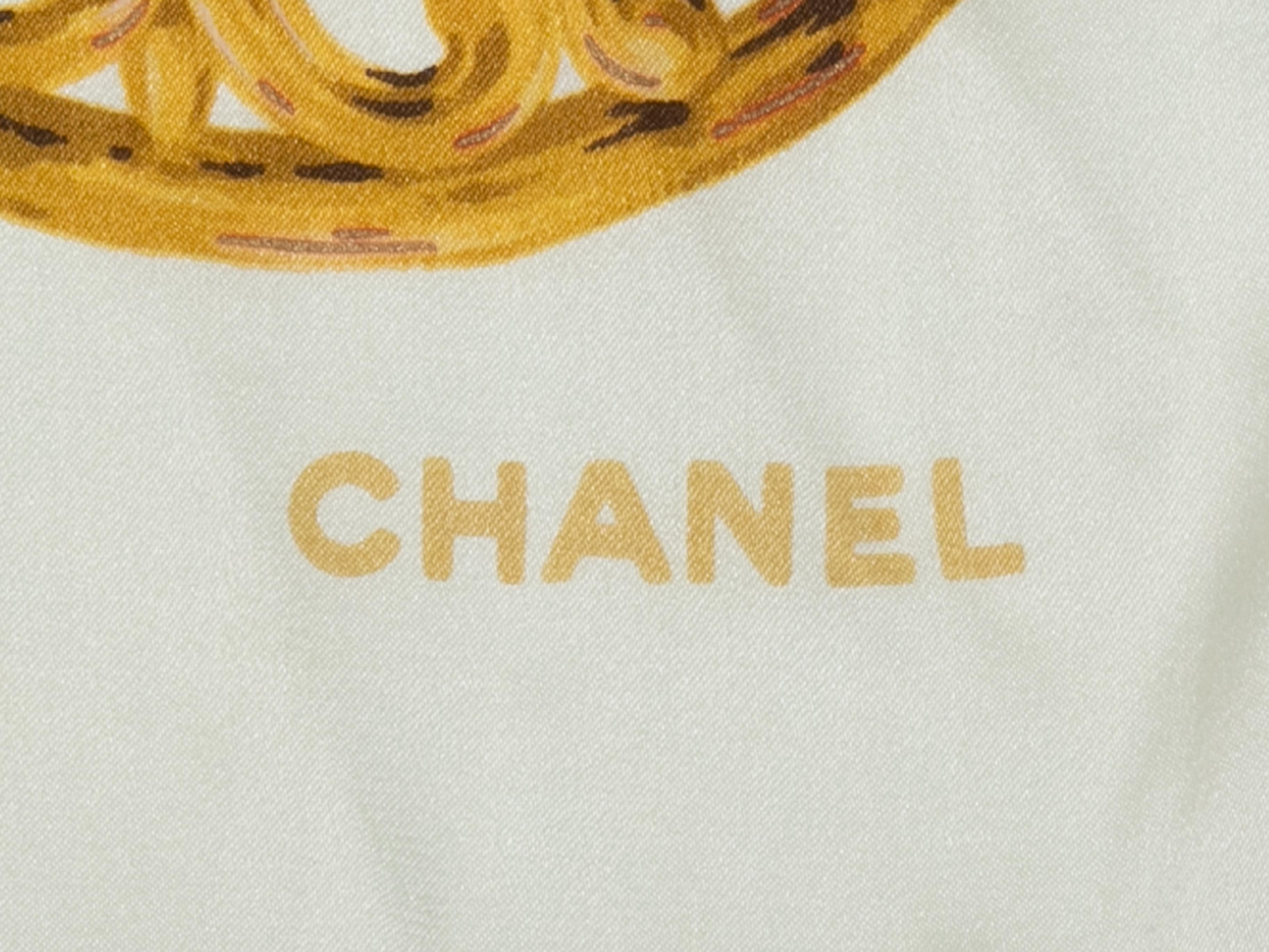 White and multicolor cabochon print silk scarf by Chanel. 39