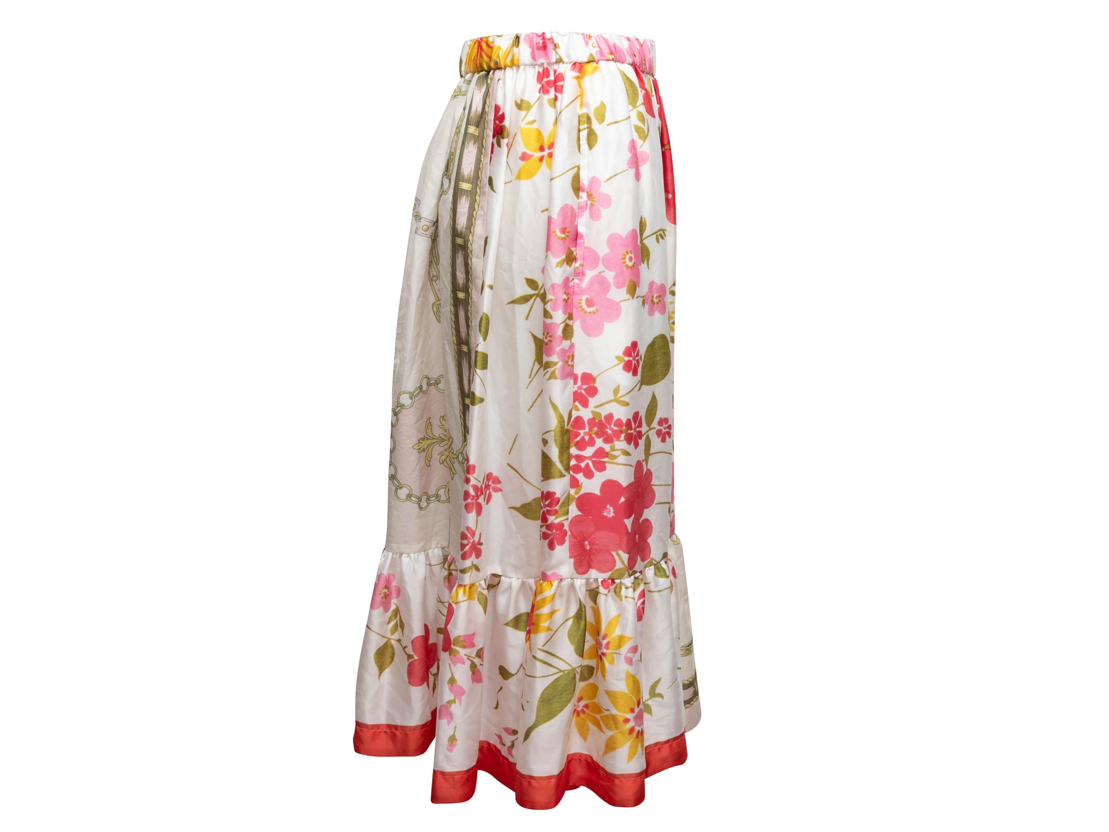 White and multicolor floral print midi skirt by Comme Des Garcons Girl. Elasticized waist. 29