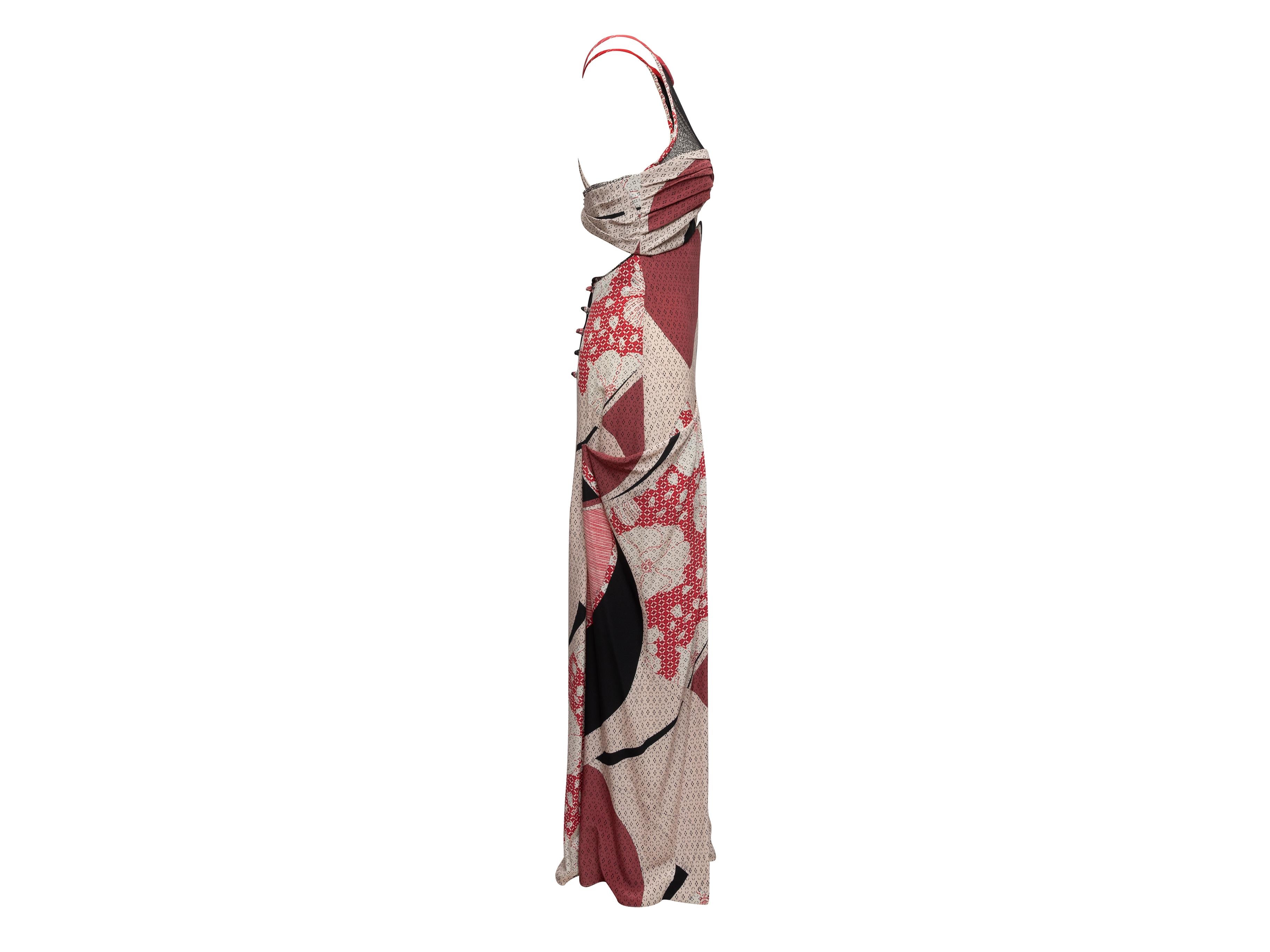 Product Details: White and multicolor silk printed maxi dress by Emilio Pucci. From the Spring/Summer 2013 Collection. Halter neck. Cutouts at front and back. Button closures at back. 32