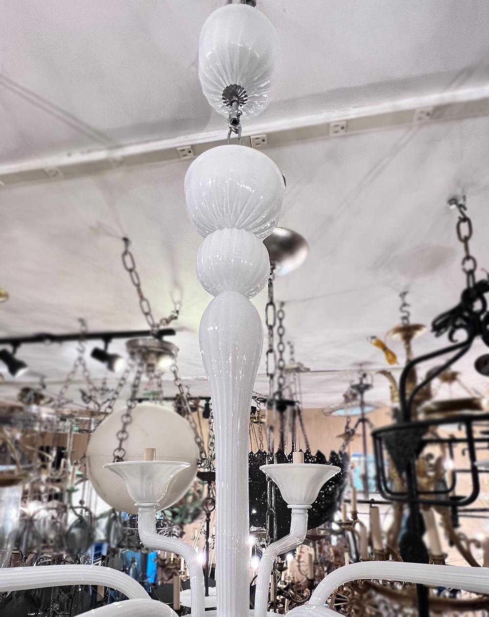 A circa 1960s Italian blown glass chandelier with 6 candelabra lights.

Measurements:
Drop: 28