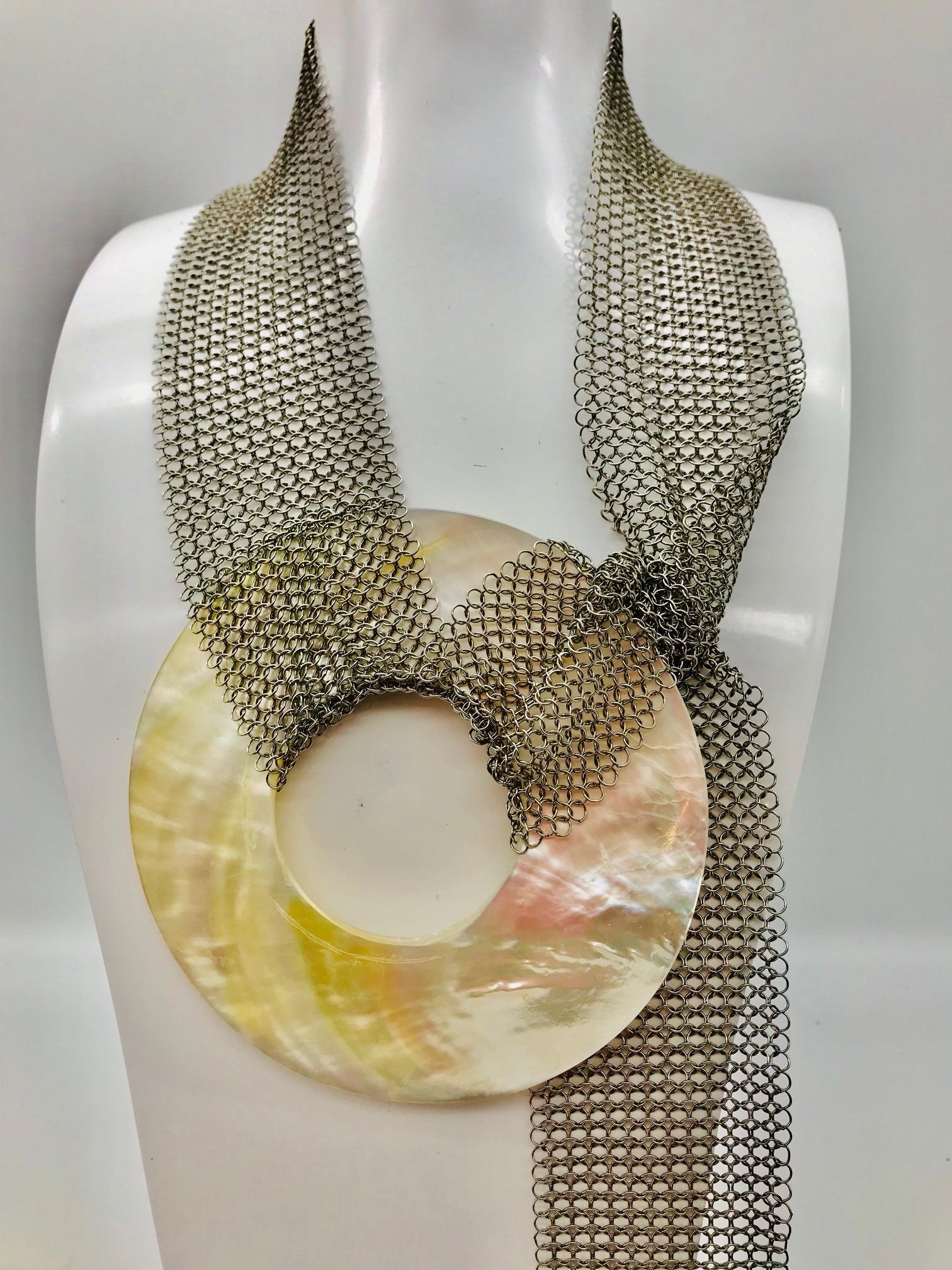 White mother of Pearl (Nacre) Belt / Necklace/ Earrings on Stainless Steel Mesh. This piece of jewelry can be worn as a Belt or Necklace.  The matching French Deco up cycled Earrings create an elegant  and very versatile set. White Nacre(MOP) is the