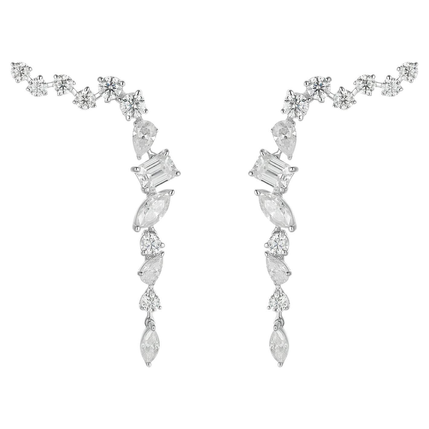 AdornA's genre-redefining designs mix easy luxury, mood-boosting bursts of color, timeless craftsmanship, and expressive, unexpected forms.

Earring Information
Diamond Type : Natural Diamond
Metal : 18k Gold
Metal Color : White Gold
Total Carat