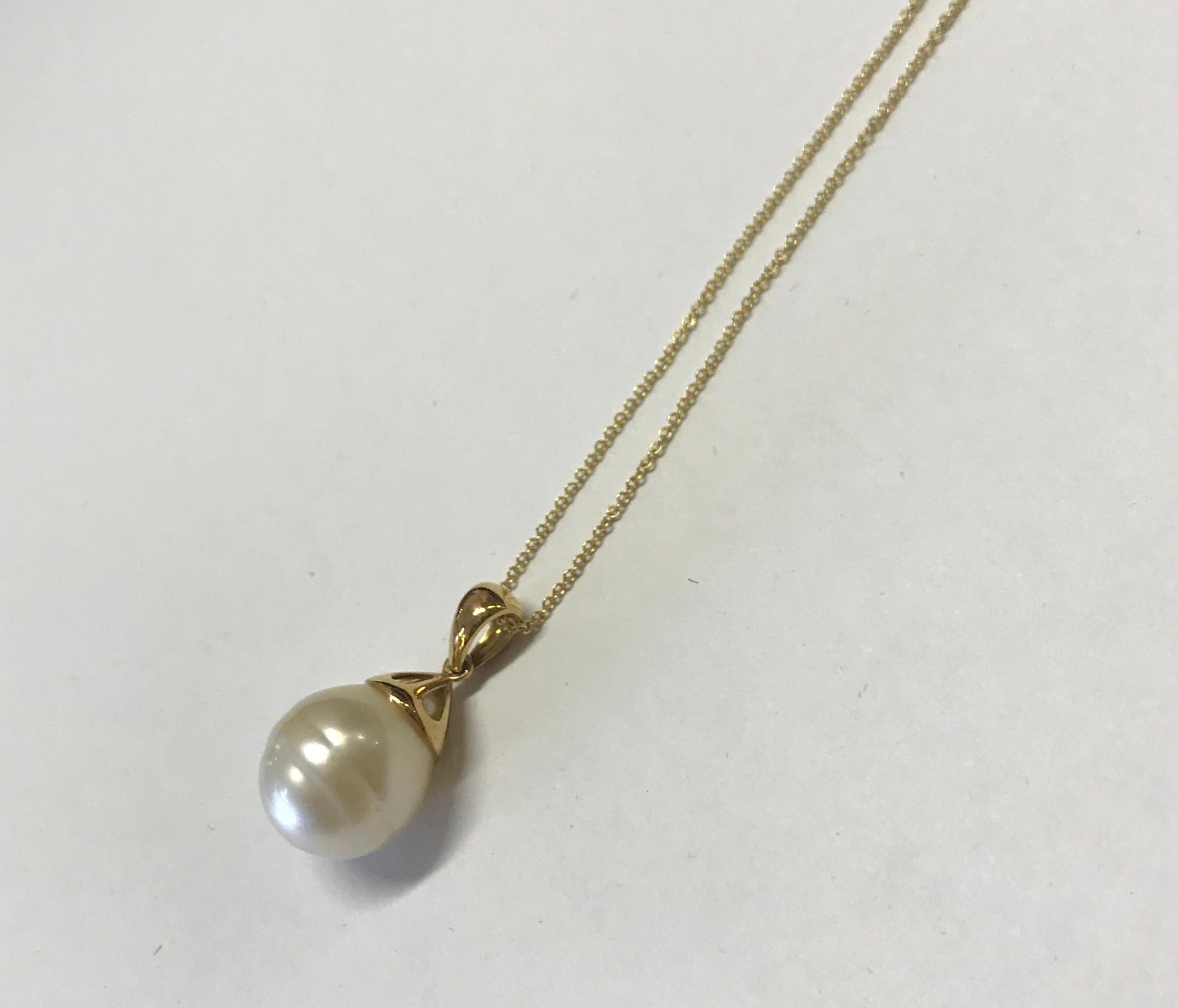 Material: 18K Yellow Gold
Center Stone Details: Pearl
Chain: 18 inches

Fine one-of-a-kind craftsmanship meets incredible quality in this breathtaking piece of jewelry.

All Alberto pieces are made in the U.S.A and include a lifetime