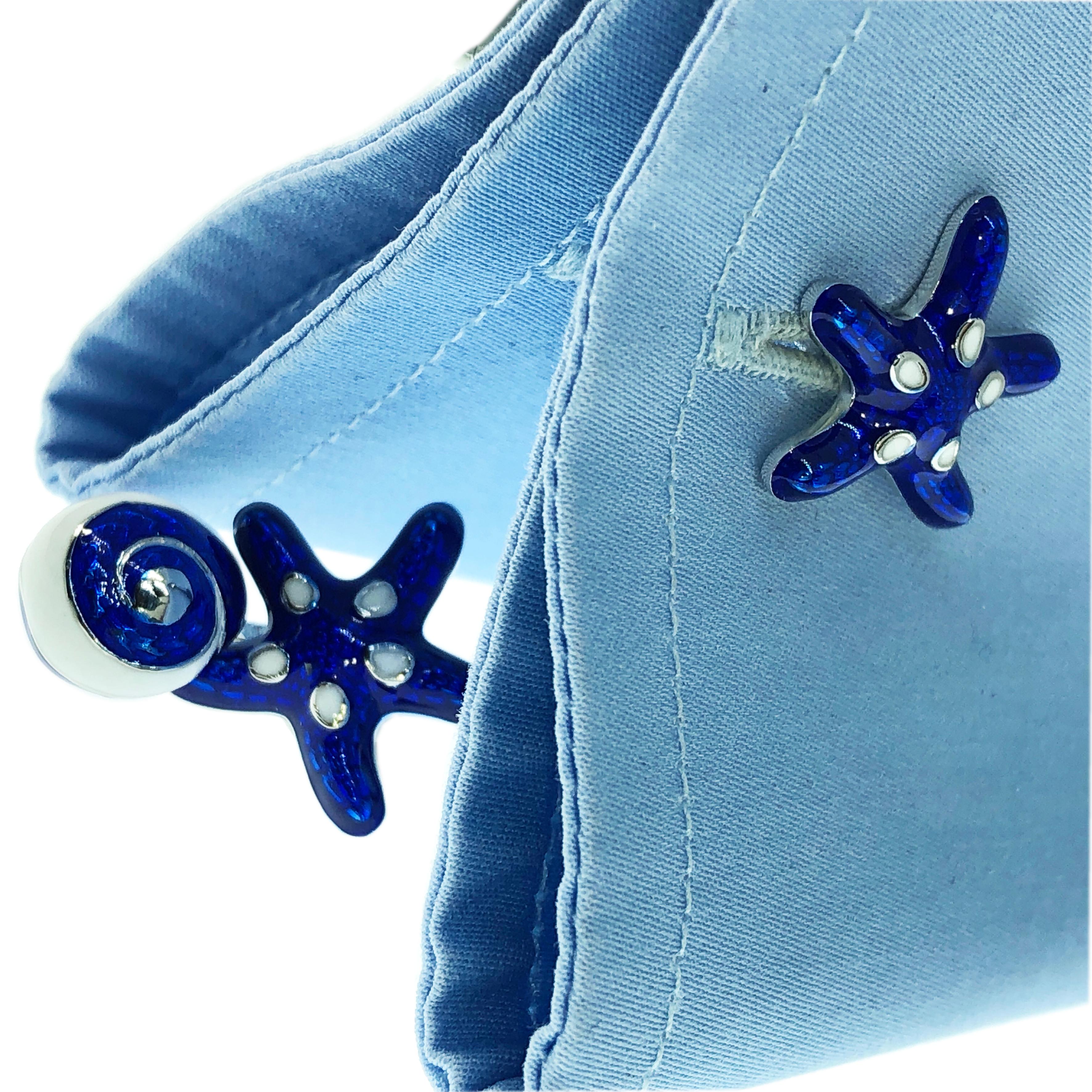 Unique, absolutely Chic, White and Navy Blue Hand Enamelled Starfish Seashell Shaped Sterling Silver Cufflinks.
In our smart fitted tobacco suede leather case and Pouch.


