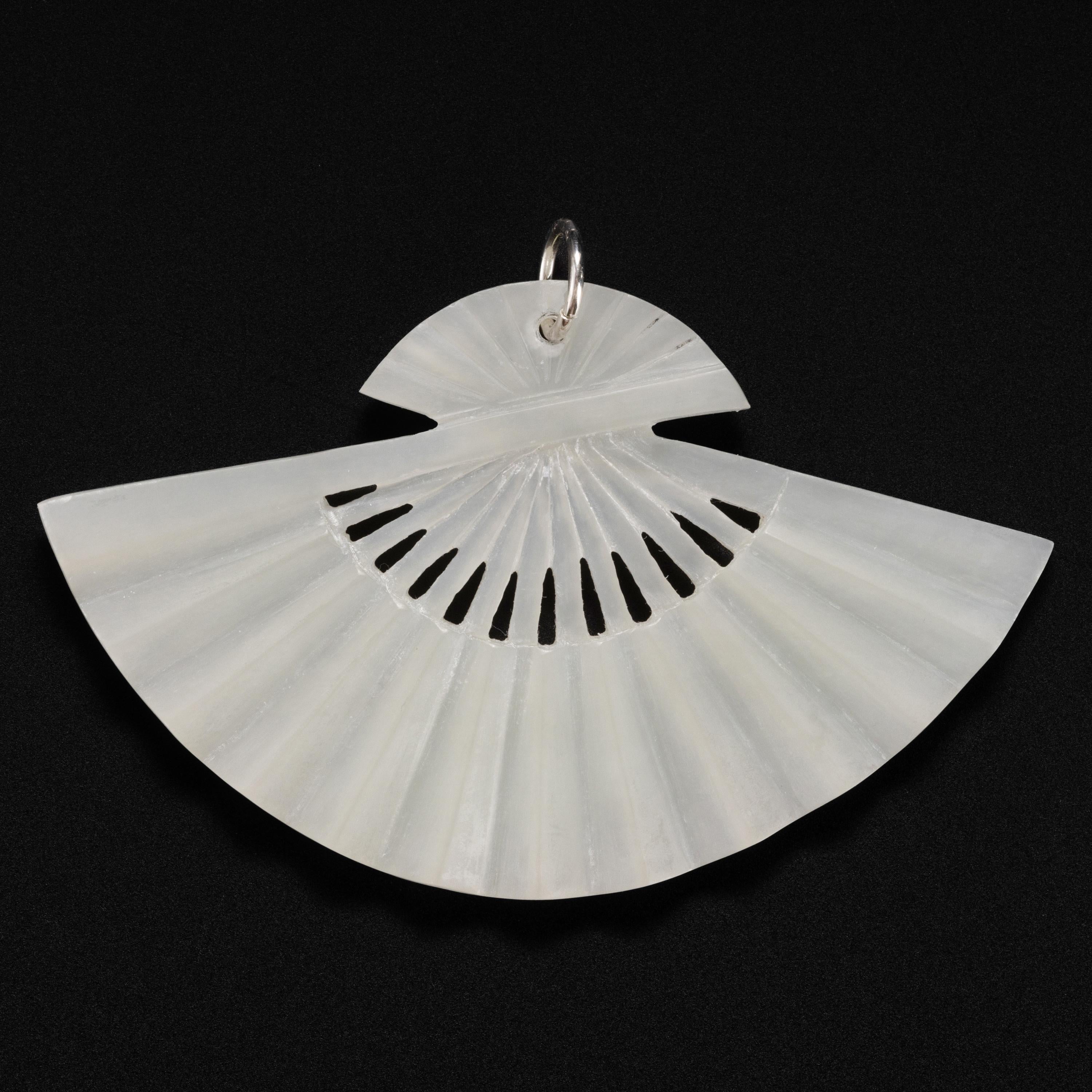 An absolutely stunning, highly translucent white nephrite jade (mutton fat) hand-carved pendant. The 89.71 x 54.77mm pendant has been carved by a master lapidary artist to depict a folding paper fan. It's a wonderful and original idea; I've never