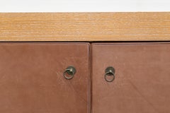 White Oak Cabinet with Saddle Leather Wrapped Doors